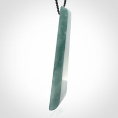 Hand carved large Guatemalan Jadeite Toki pendant.