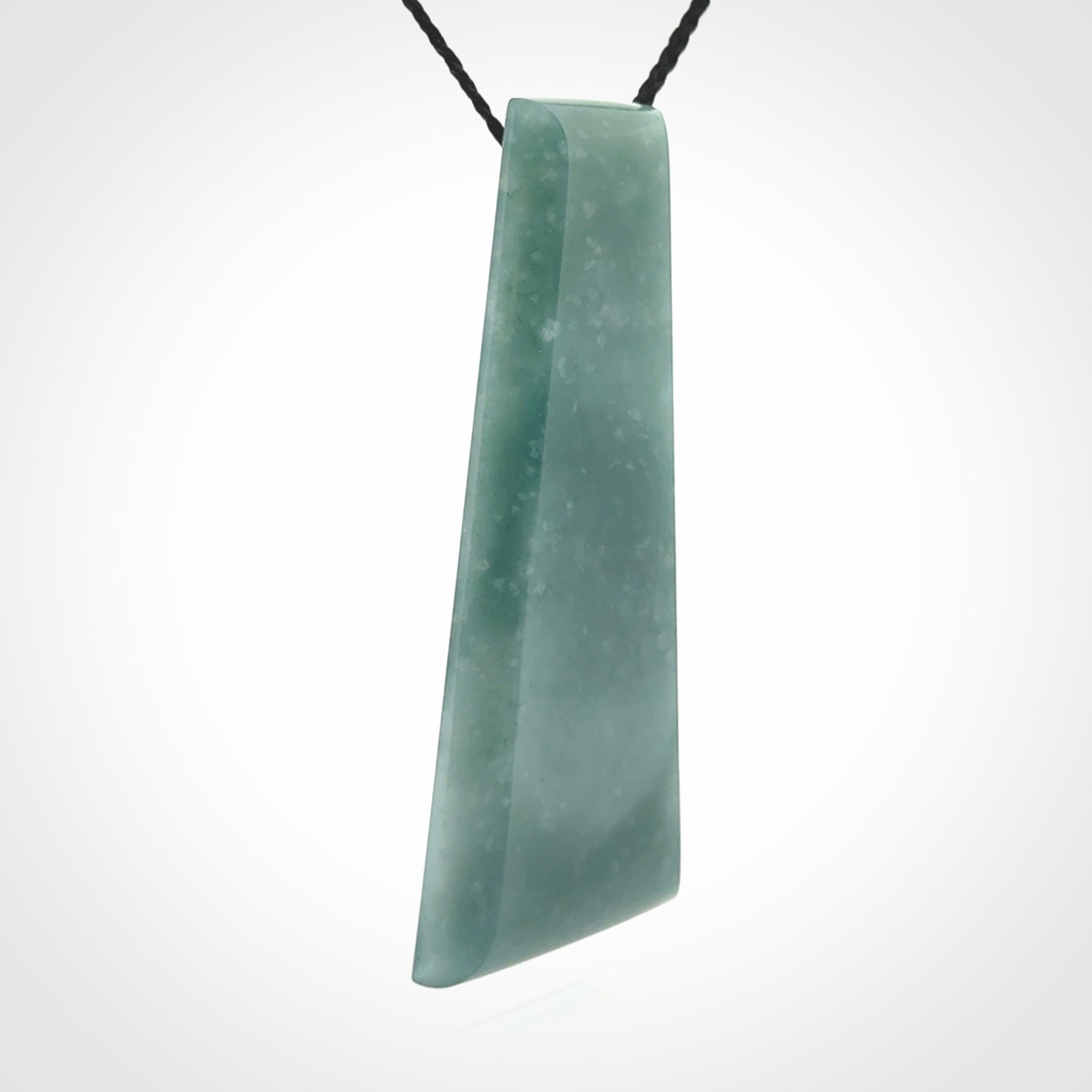 Hand carved large Guatemalan Jadeite Toki pendant.