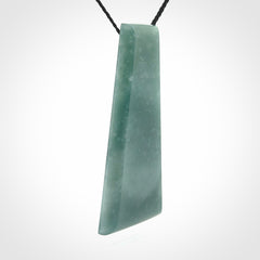 Hand carved large Guatemalan Jadeite Toki pendant.