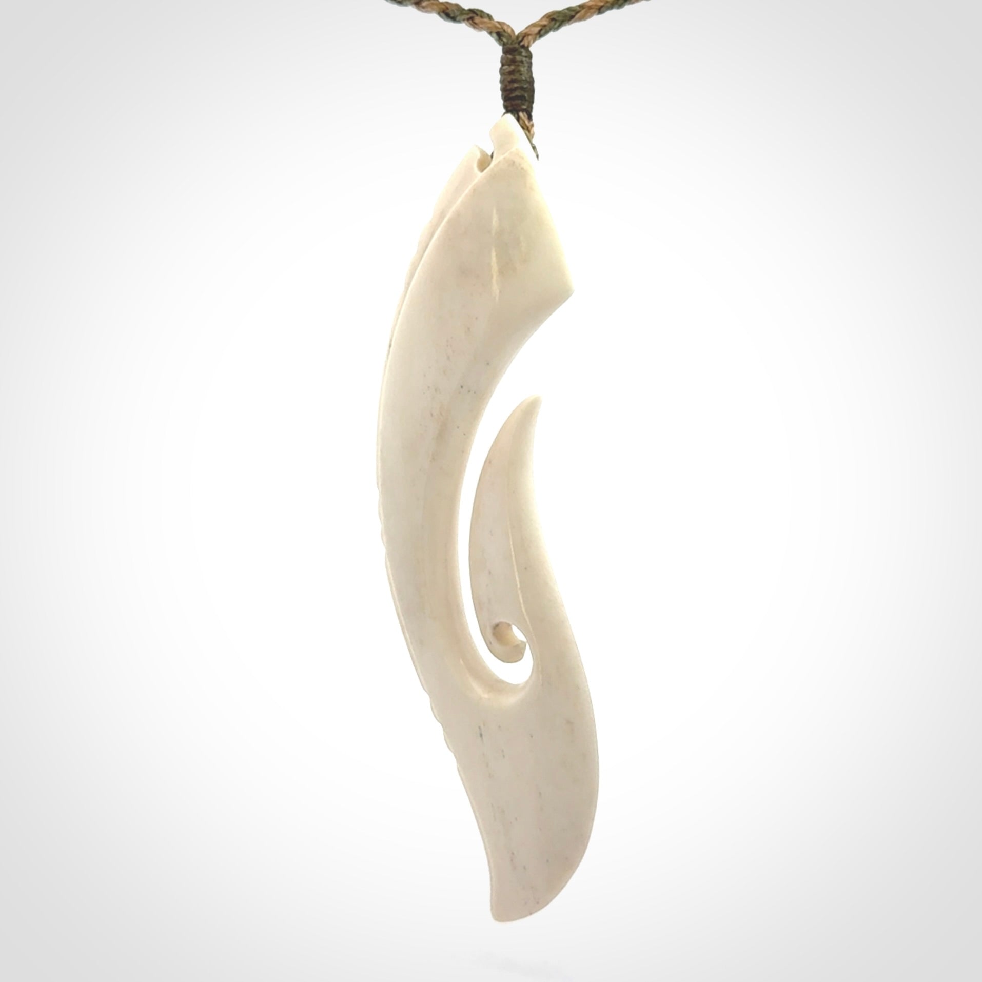 Hand carved large bone hook pendant