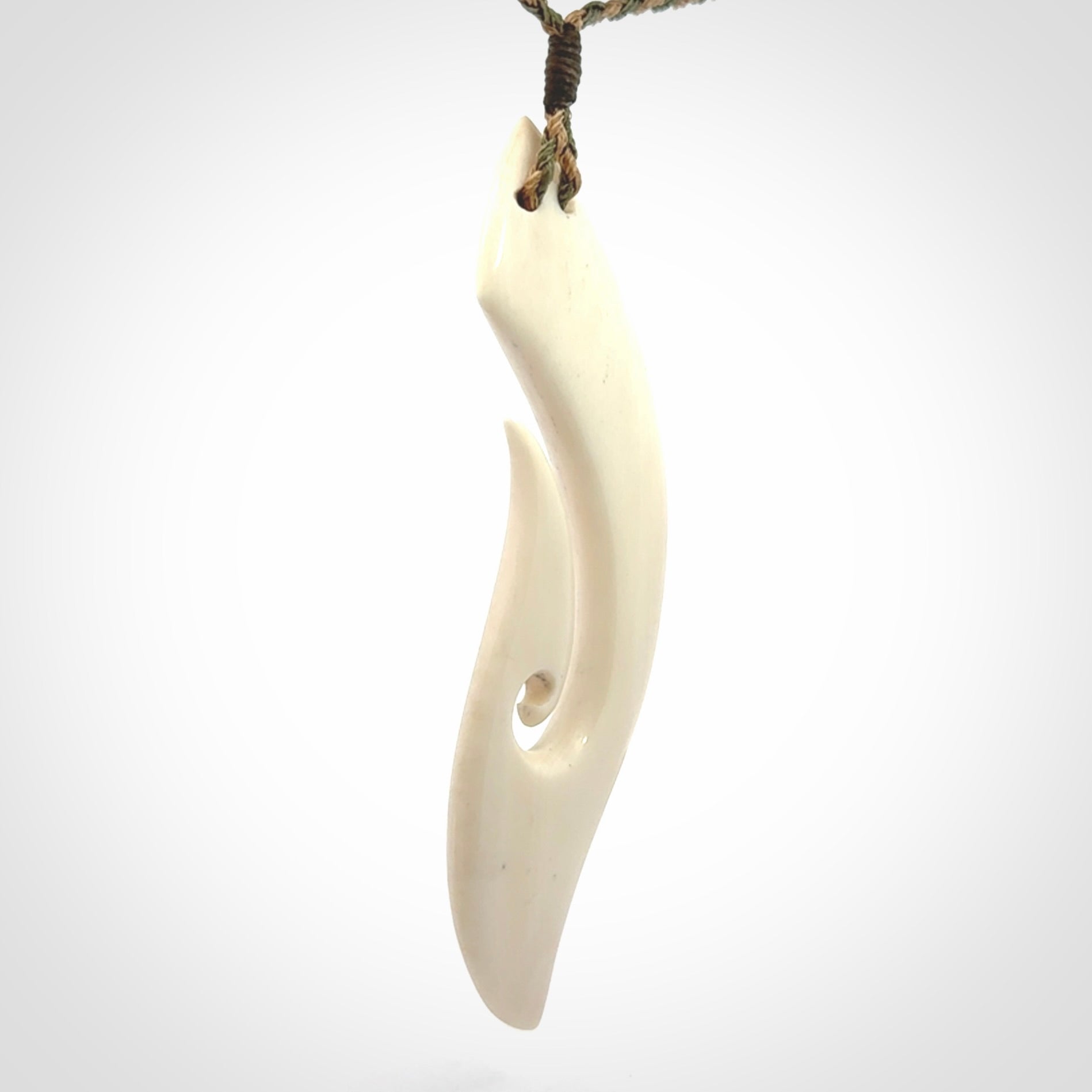 Hand carved large bone hook pendant