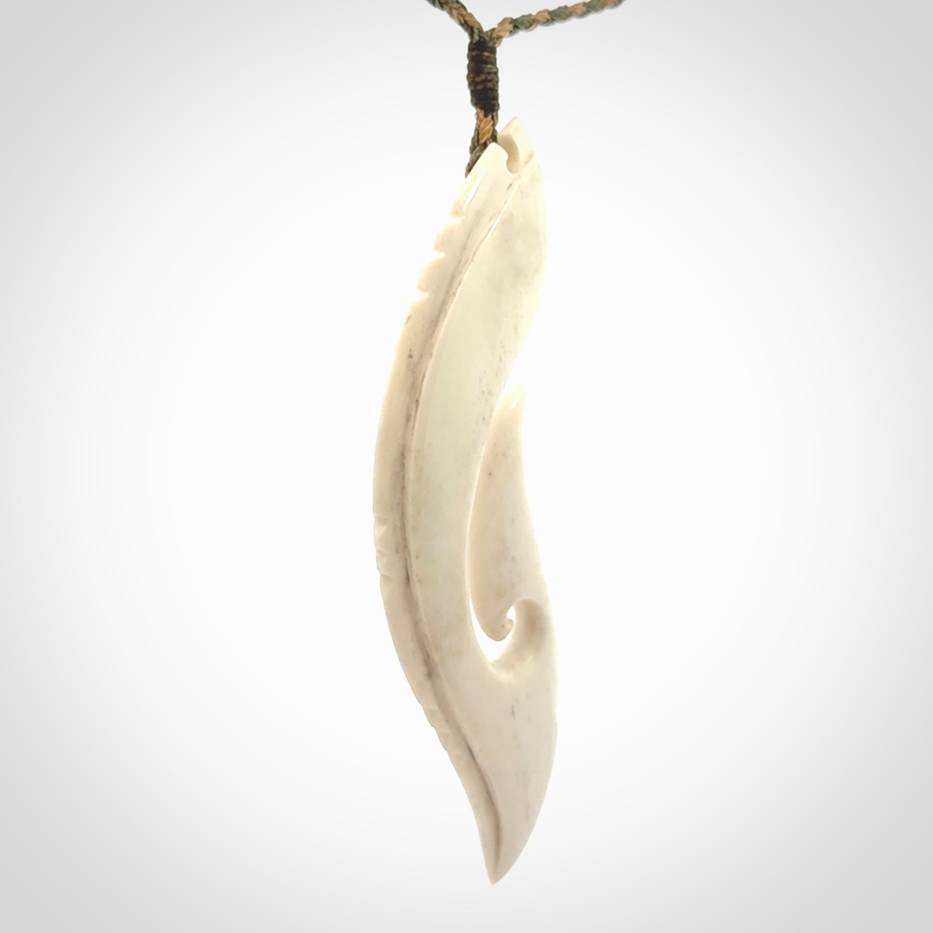 Hand carved large bone hook pendant
