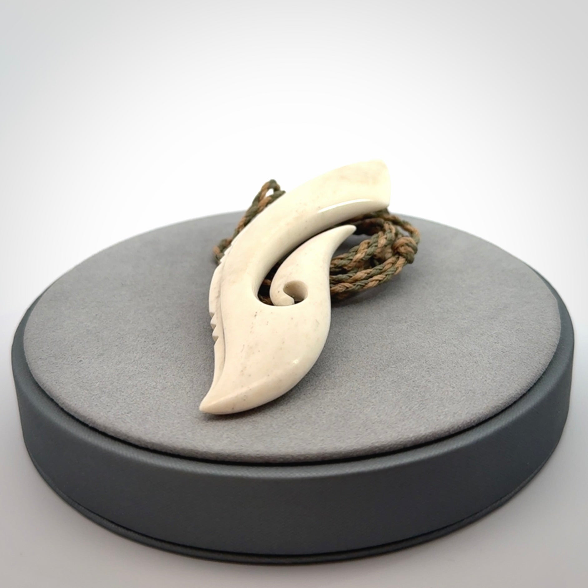 Hand carved large bone hook pendant
