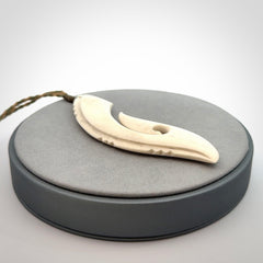 Hand carved large bone hook pendant