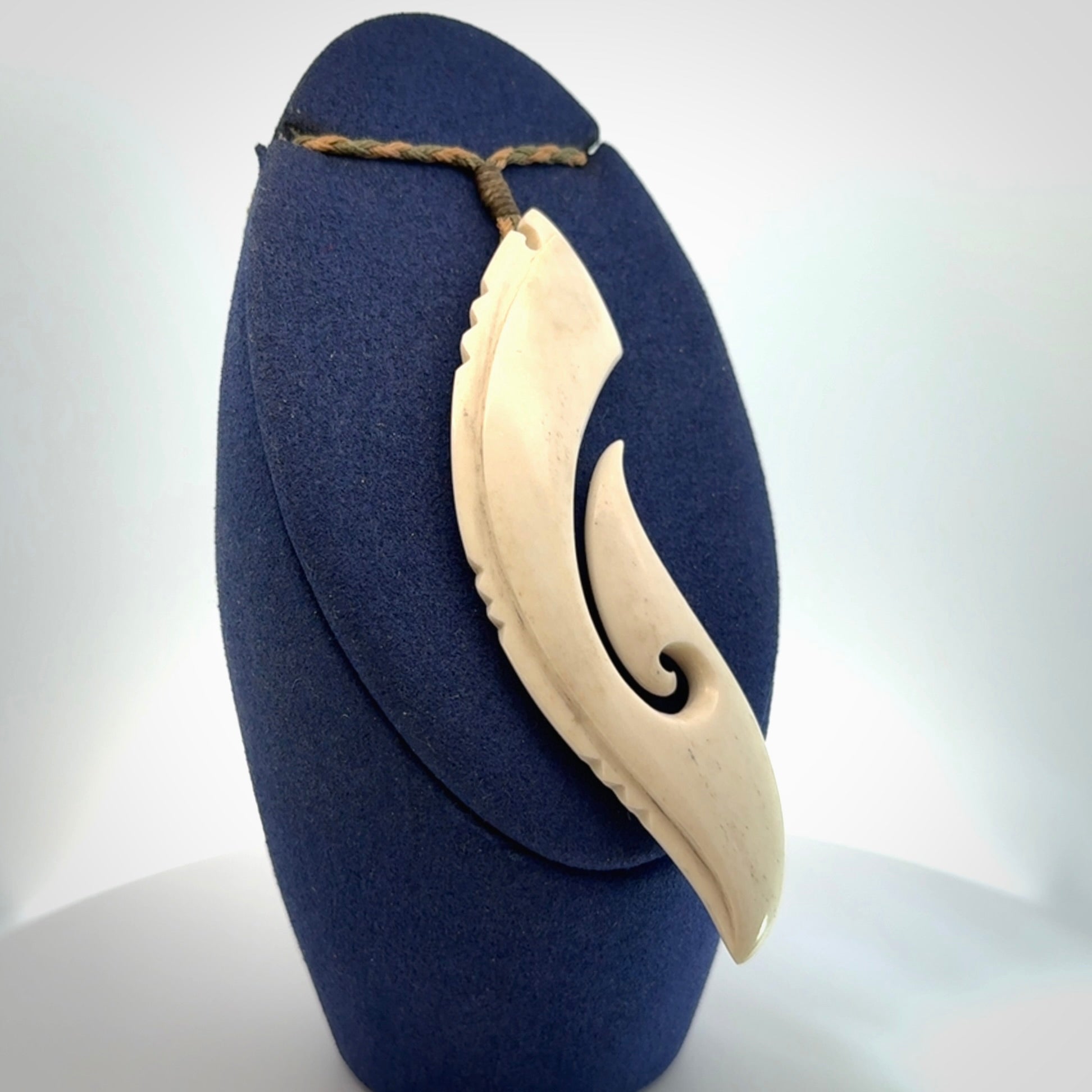 Hand carved large bone hook pendant