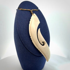 Hand carved large bone hook pendant