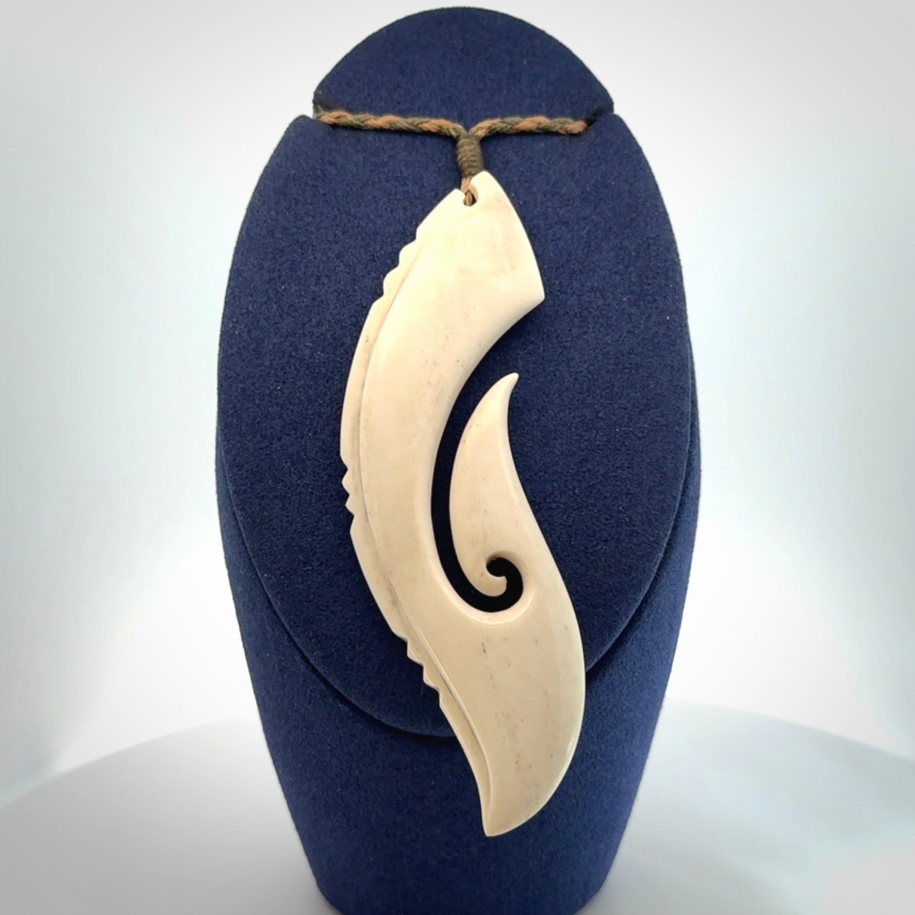 Hand carved large bone hook pendant