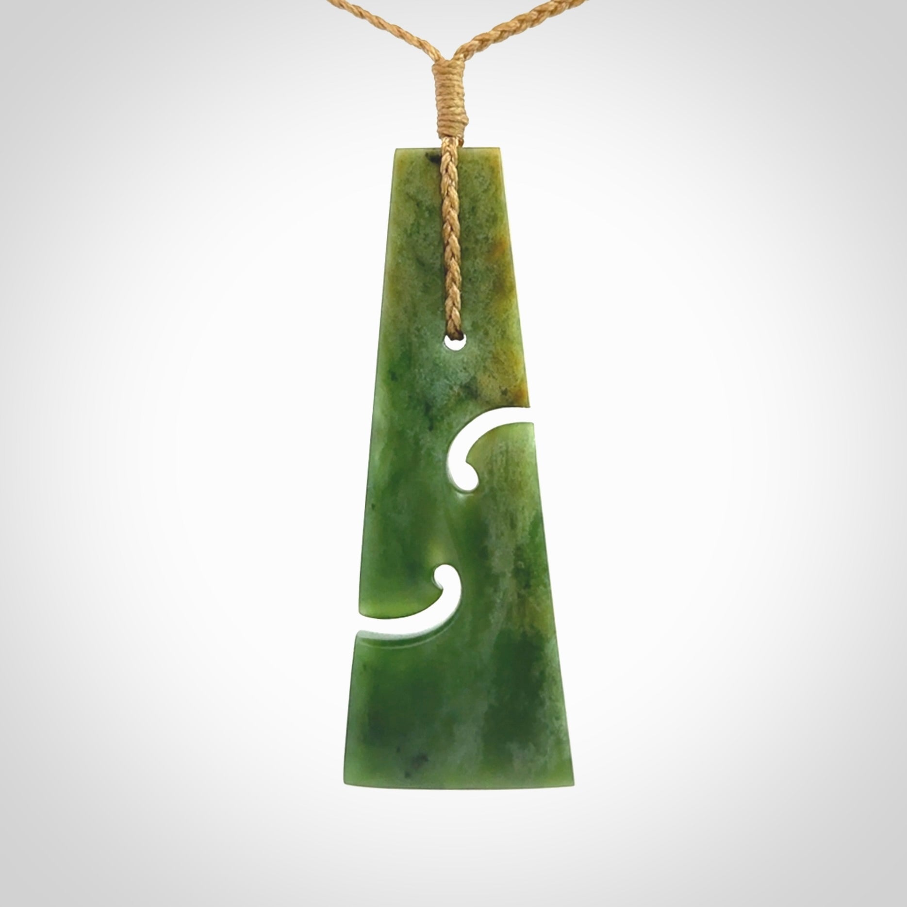 Hand made New Zealand jade toki with double koru pendant. Hand carved in New Zealand by Kerry Thompson. 