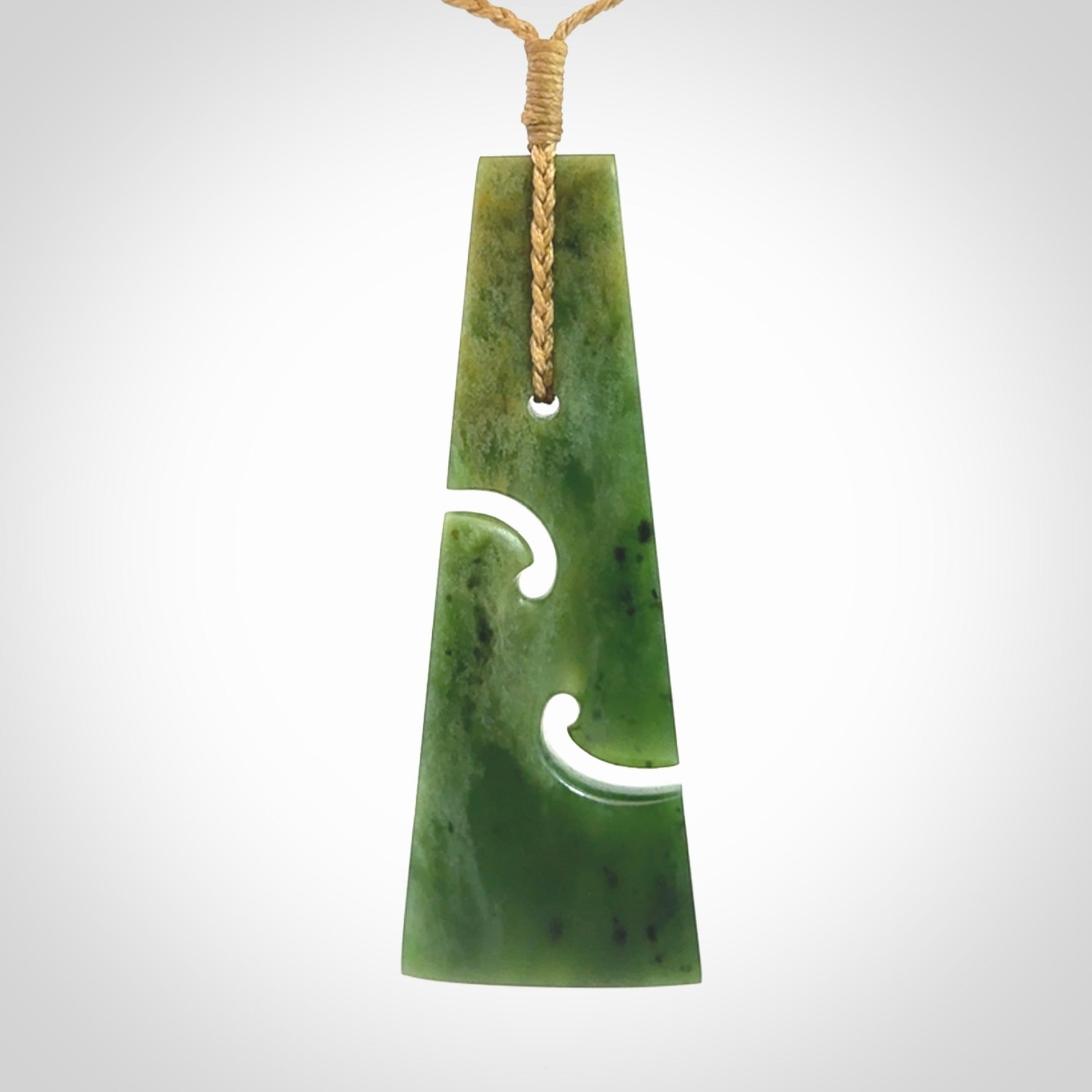 Hand made New Zealand jade toki with double koru pendant. Hand carved in New Zealand by Kerry Thompson. 