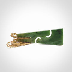 Hand made New Zealand jade toki with double koru pendant. Hand carved in New Zealand by Kerry Thompson. 