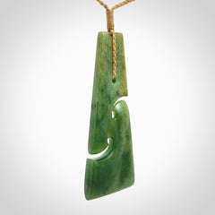 Hand made New Zealand jade toki with double koru pendant. Hand carved in New Zealand by Kerry Thompson. 