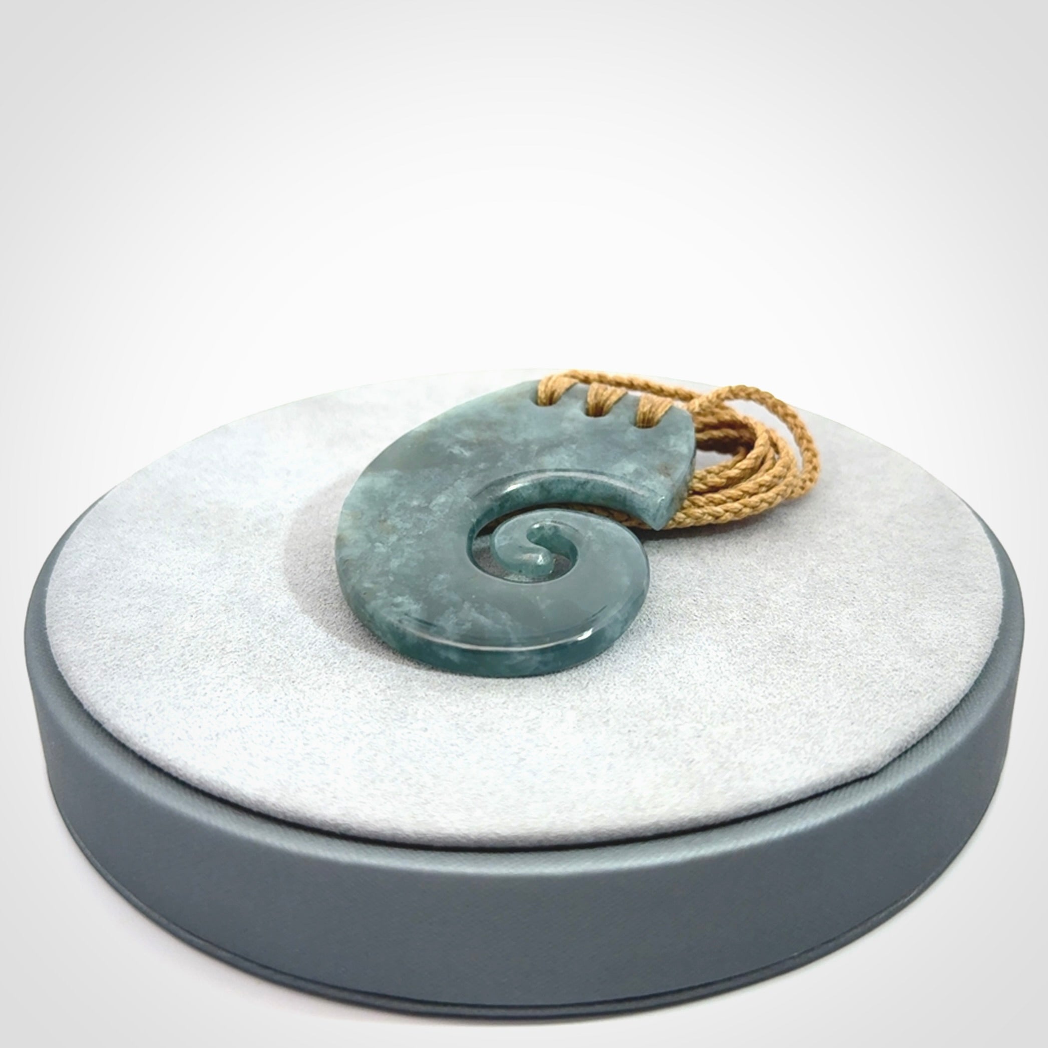 Hand Carved Koru pendant in Gorgeous Guatemalan Jadeite