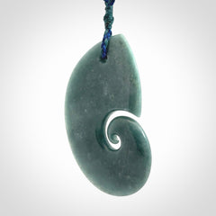 Hand carved Guatemalan Jade koru pendant.