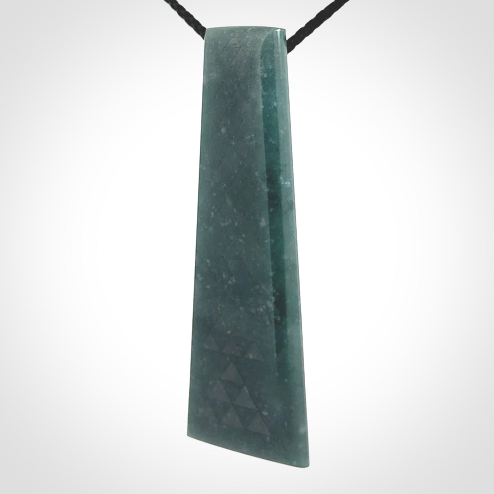 Hand carved large Guatemalan Jadeite Toki pendant.