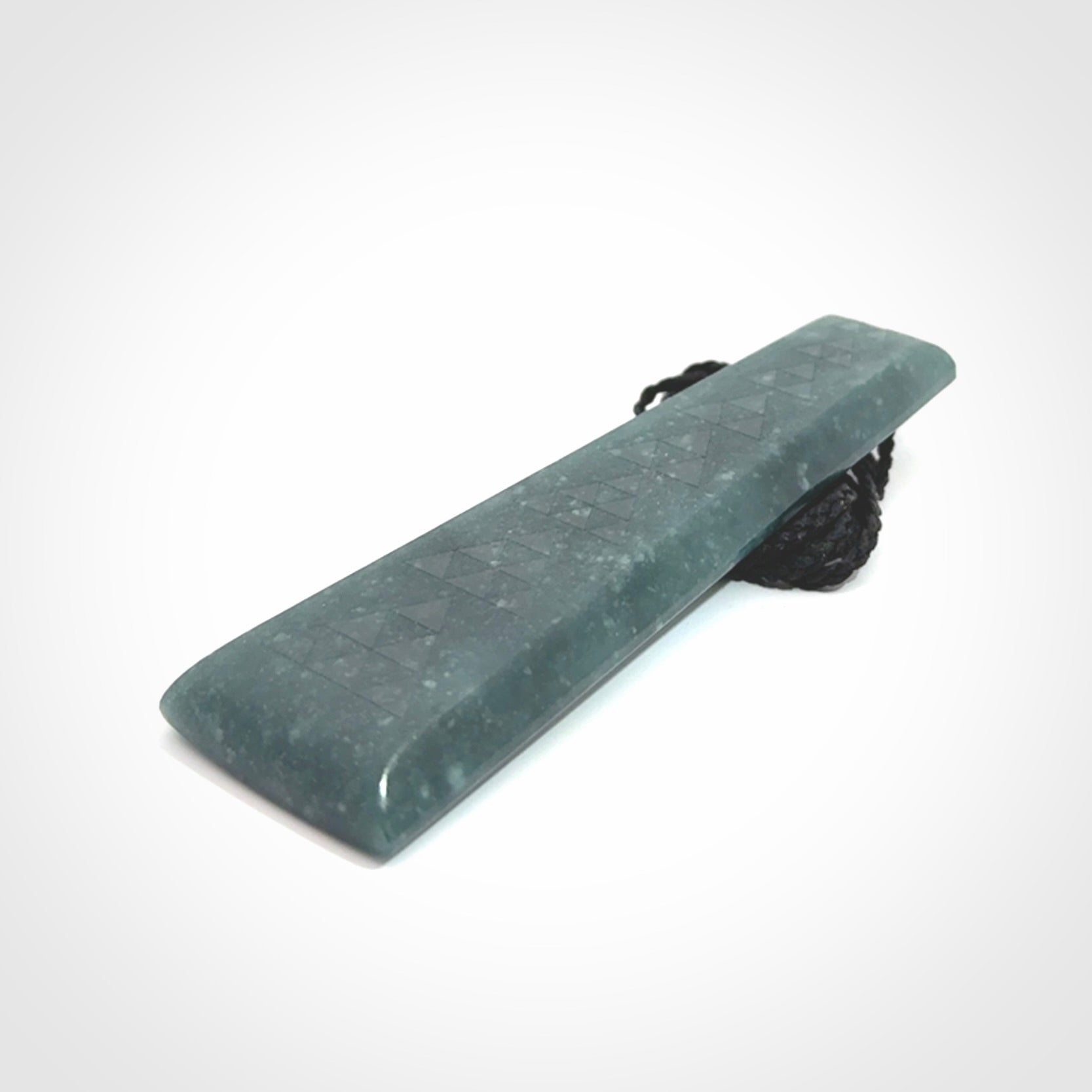 Hand carved large Guatemalan Jadeite Toki pendant.