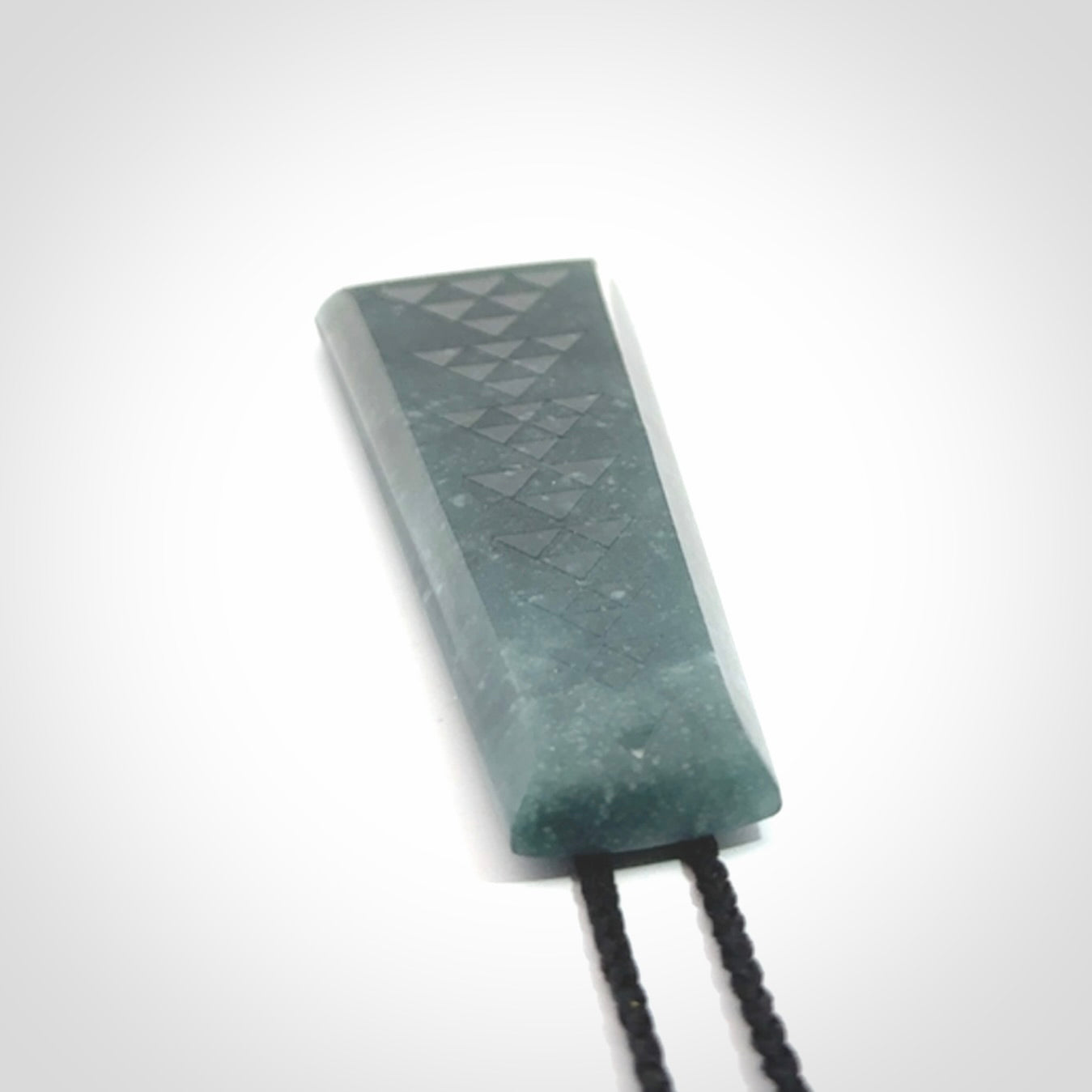 Hand carved large Guatemalan Jadeite Toki pendant.