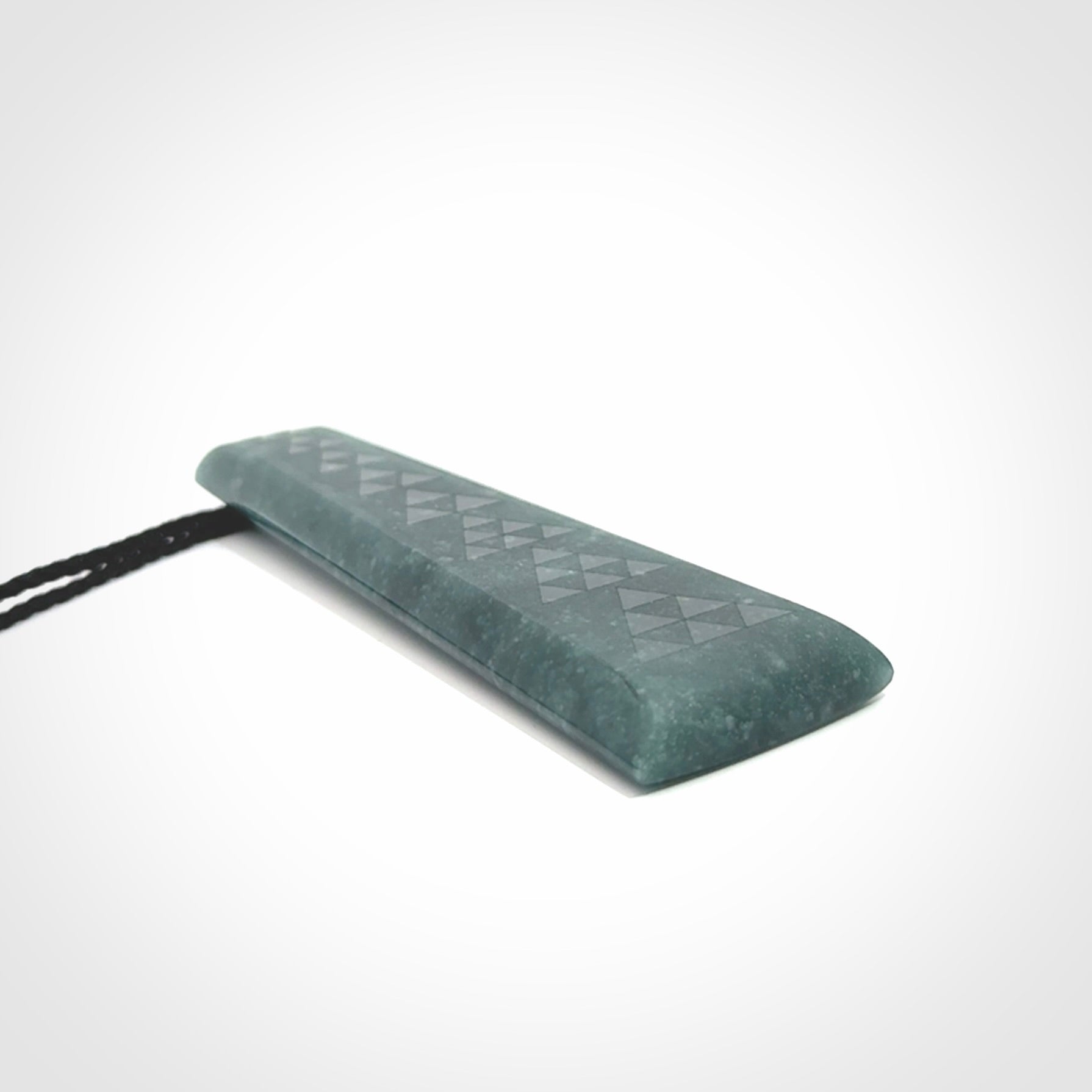 Hand carved large Guatemalan Jadeite Toki pendant.