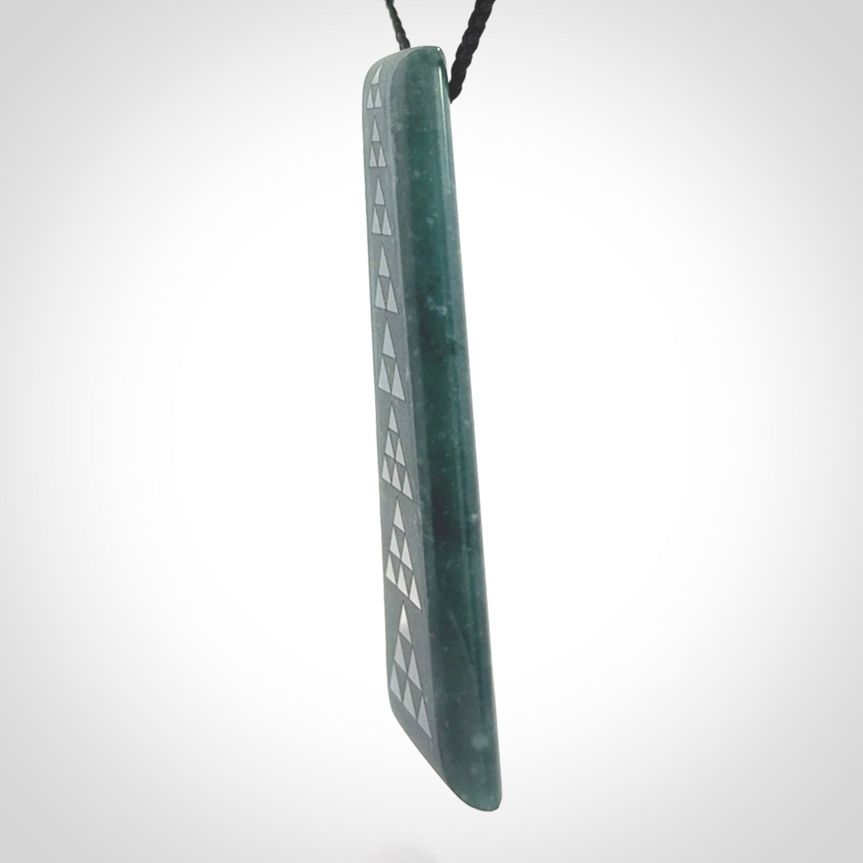 Hand carved large Guatemalan Jadeite Toki pendant.