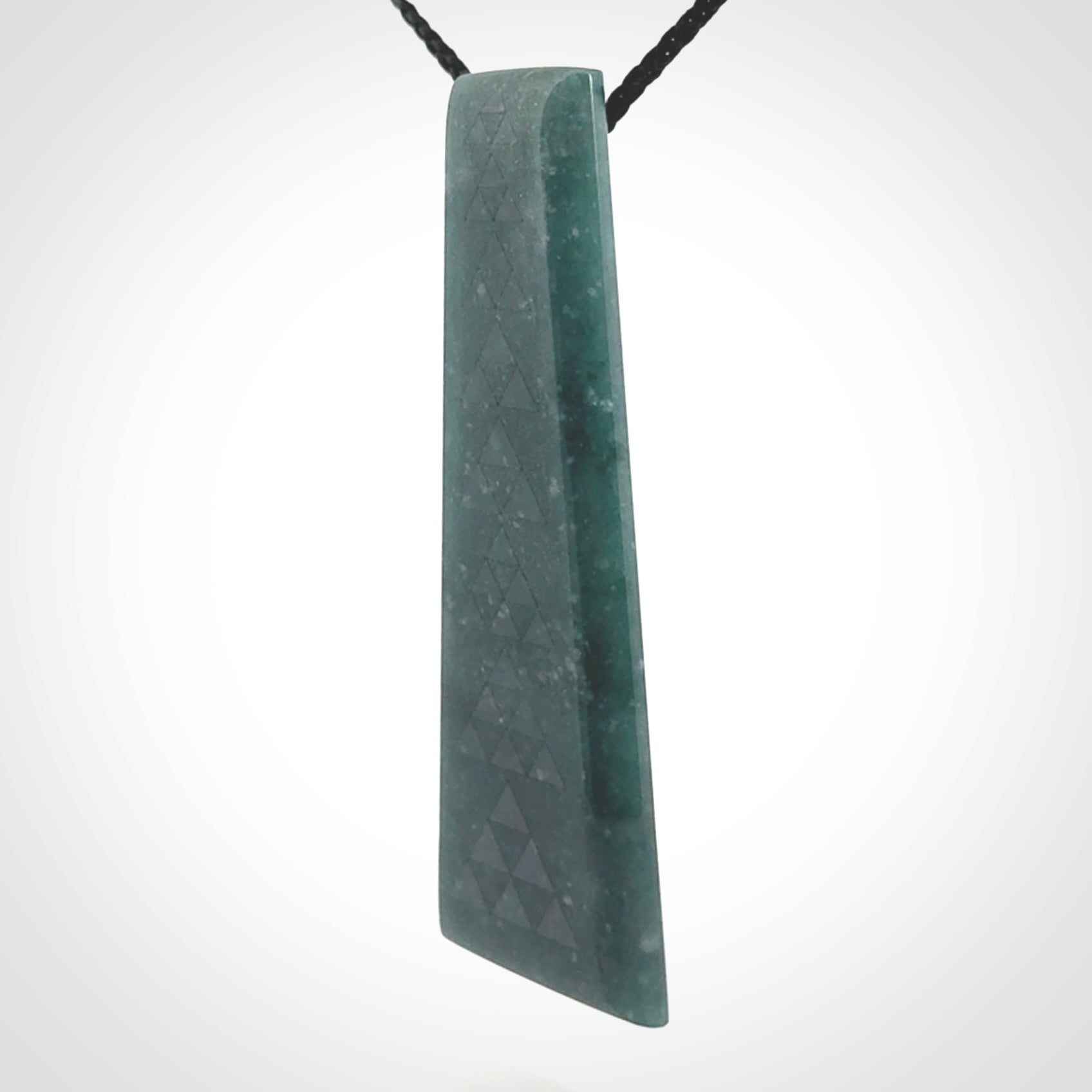 Hand carved large Guatemalan Jadeite Toki pendant.