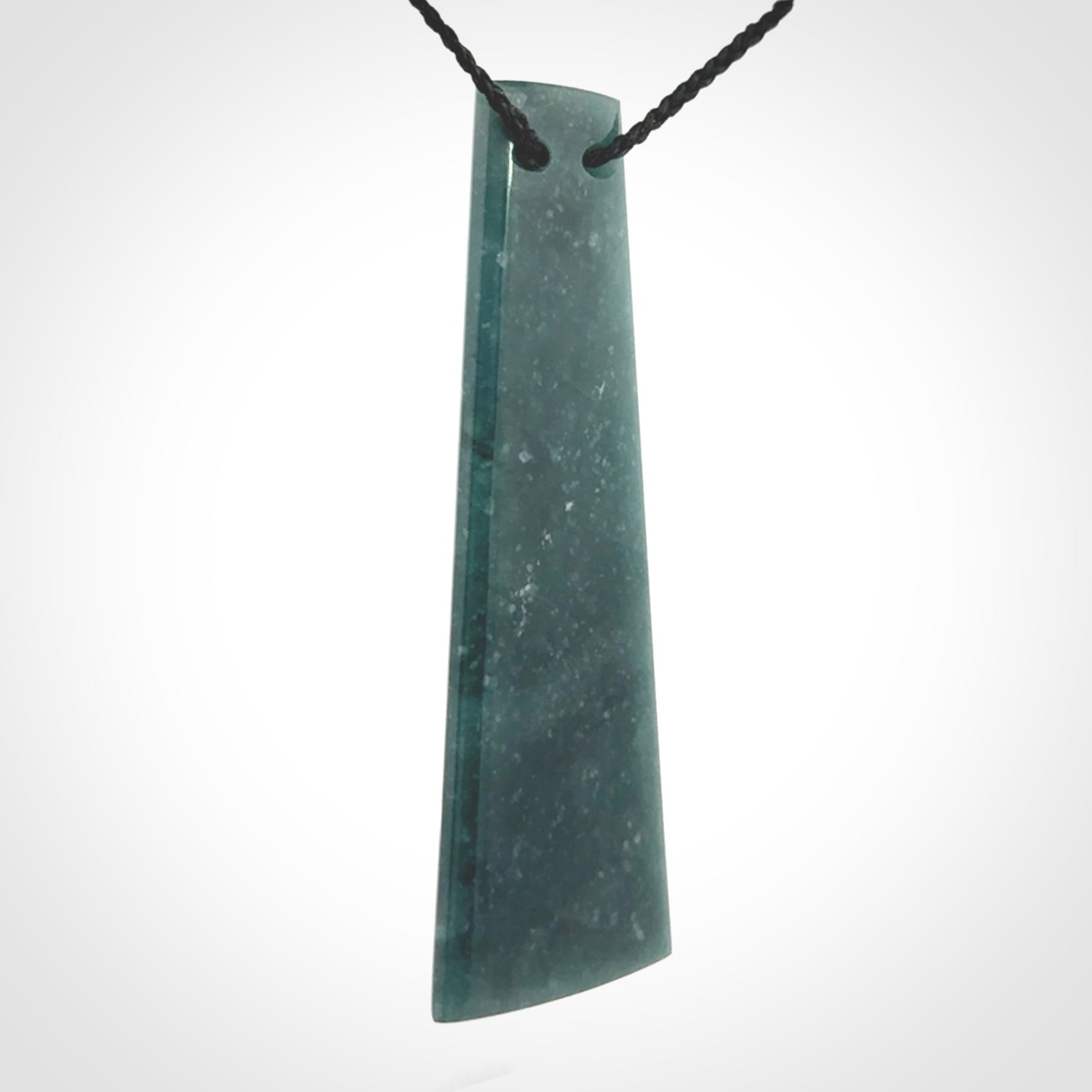 Hand carved large Guatemalan Jadeite Toki pendant.