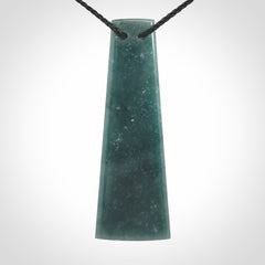 Hand carved large Guatemalan Jadeite Toki pendant.