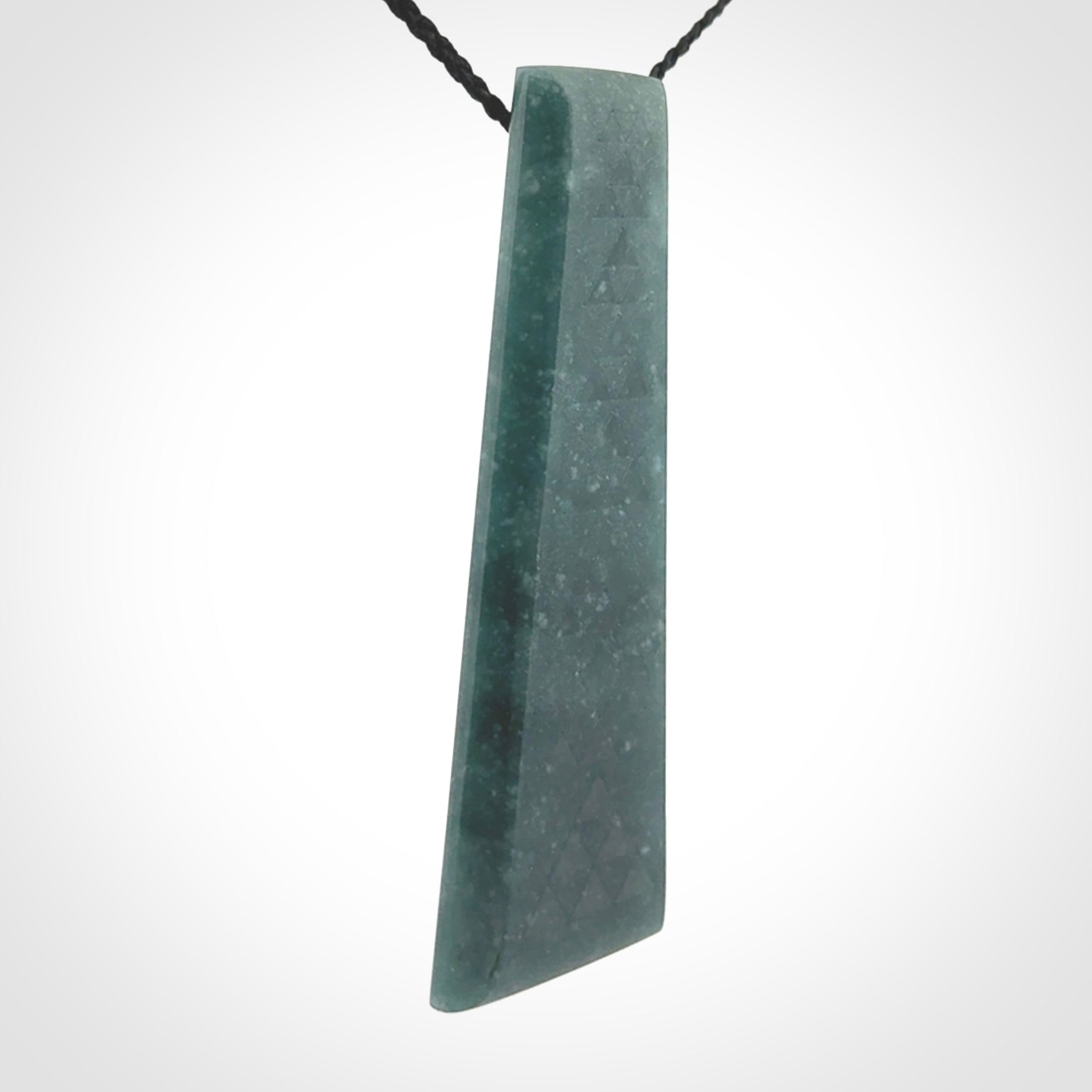 Hand carved large Guatemalan Jadeite Toki pendant.