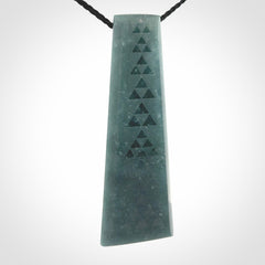 Hand carved large Guatemalan Jadeite Toki pendant.