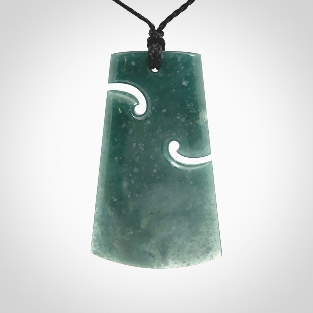 Hand carved large Guatemalan Jadeite Toki pendant.