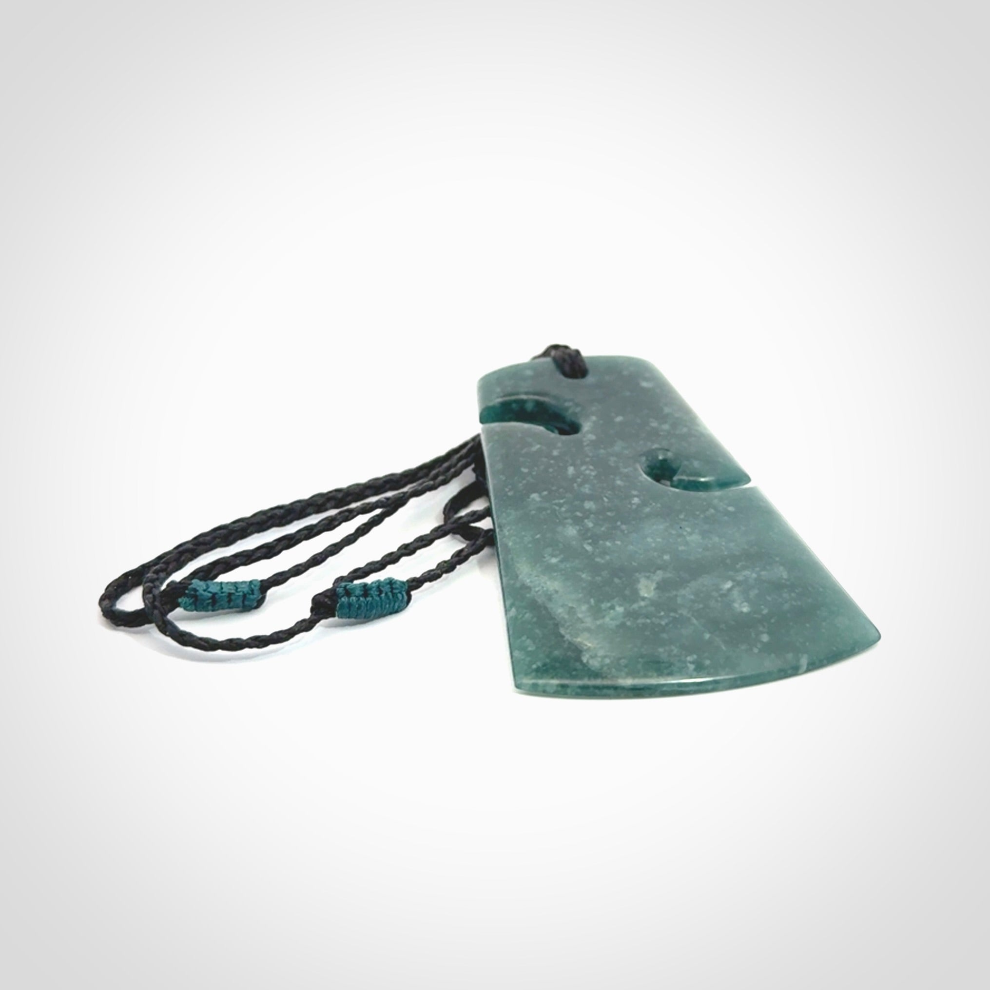 Hand carved large Guatemalan Jadeite Toki pendant.