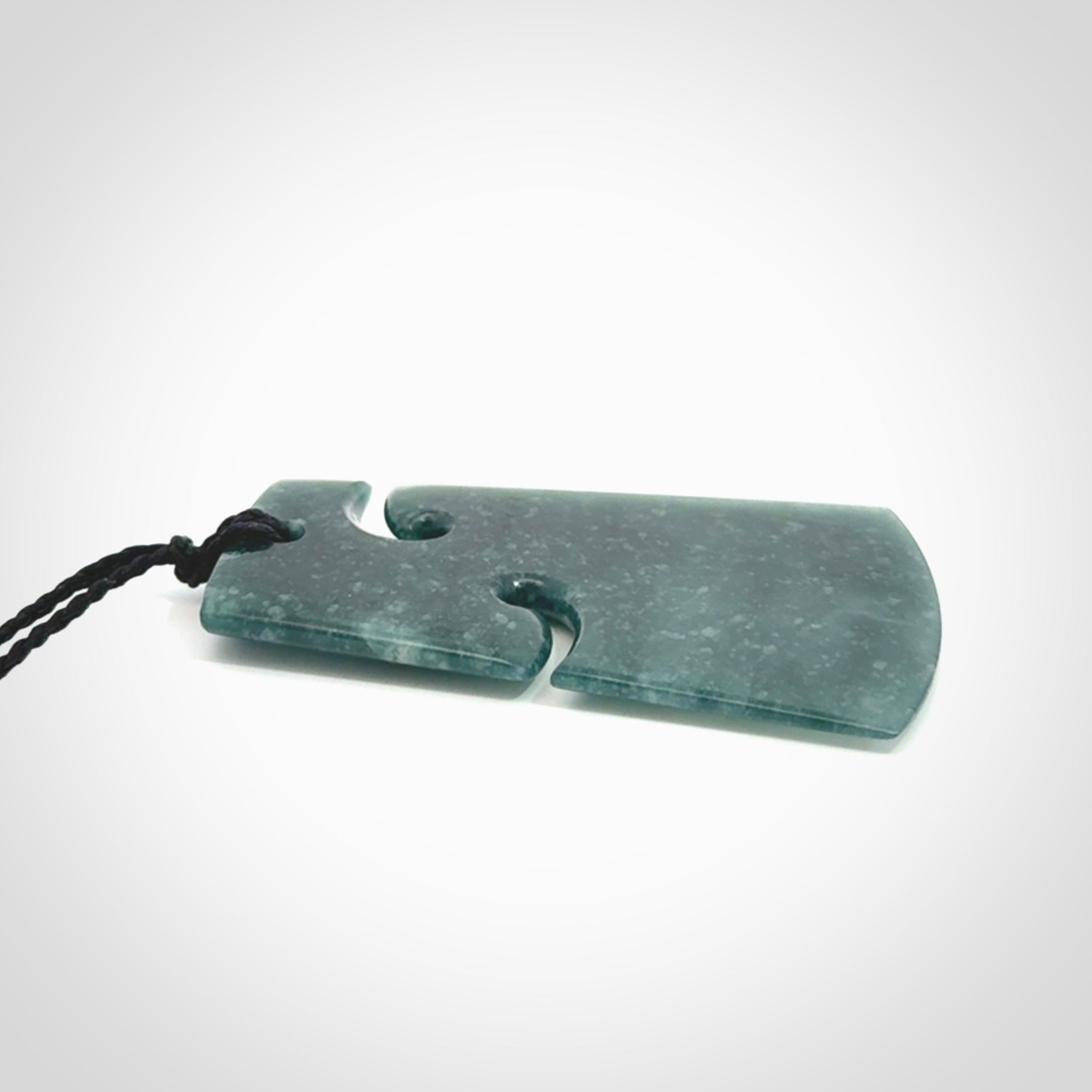Hand carved large Guatemalan Jadeite Toki pendant.