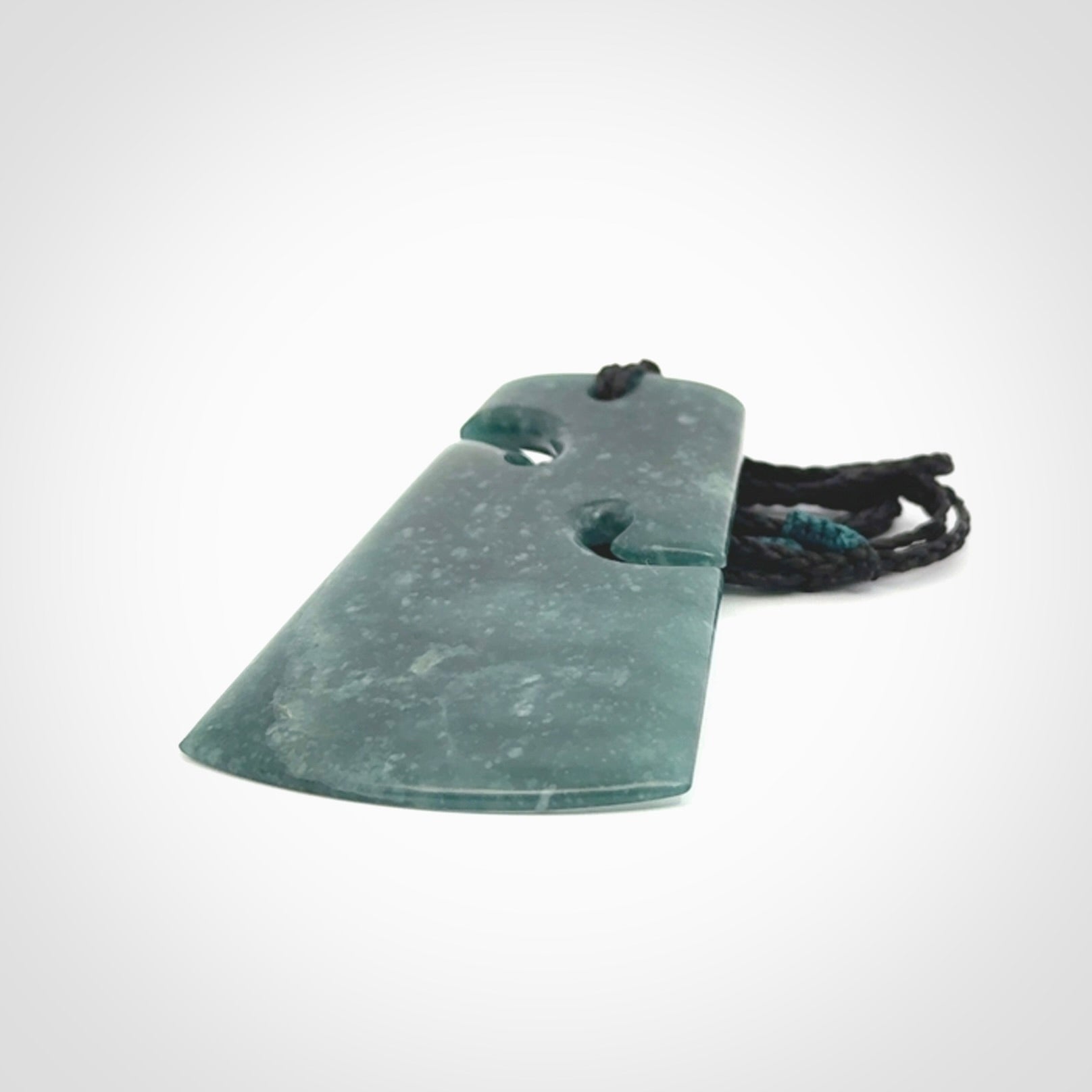 Hand carved large Guatemalan Jadeite Toki pendant.