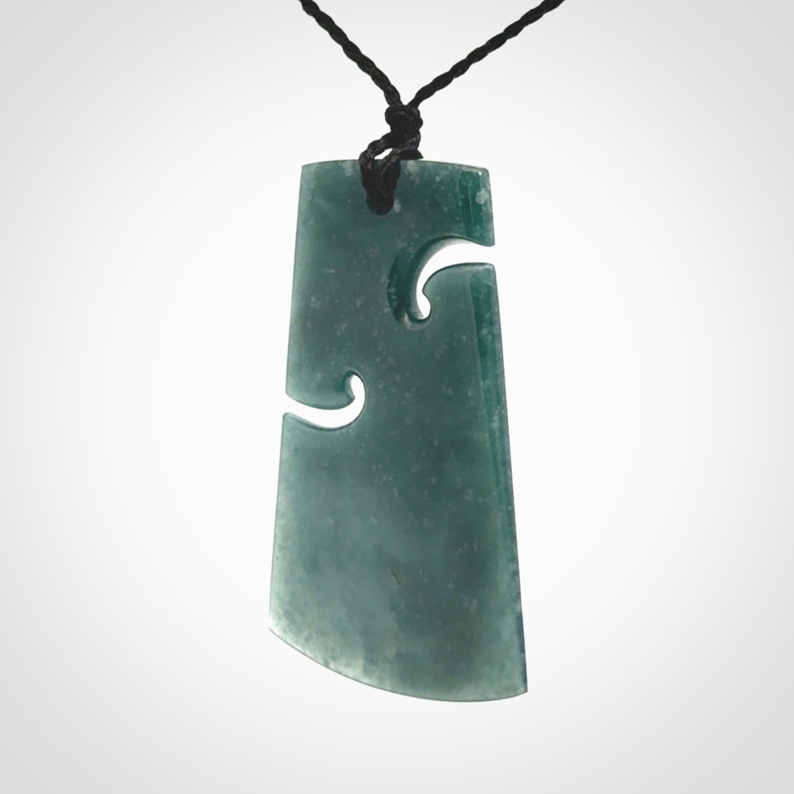 Hand carved large Guatemalan Jadeite Toki pendant.