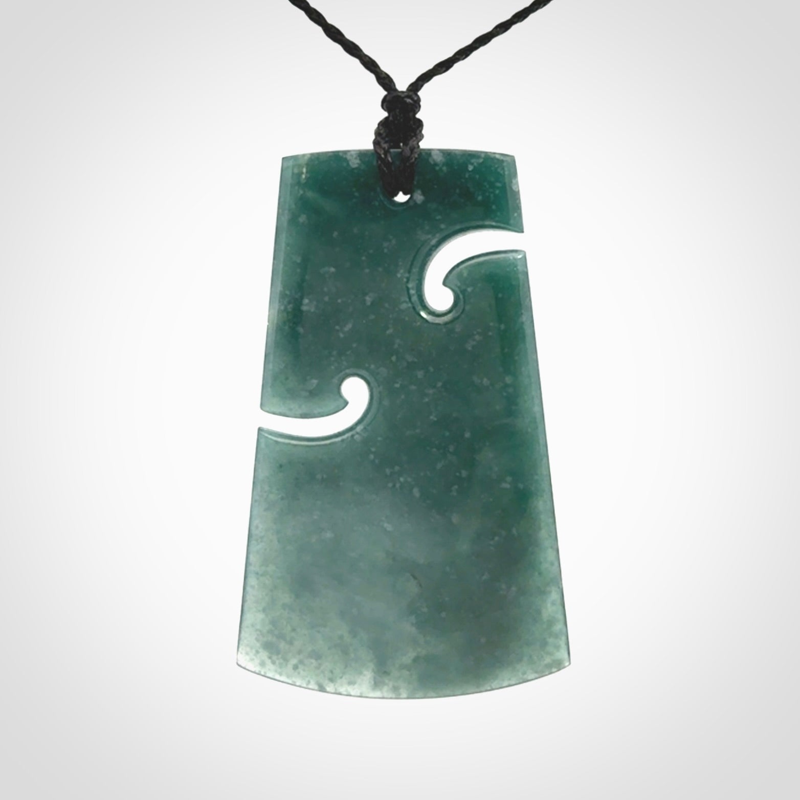 Hand carved large Guatemalan Jadeite Toki pendant.