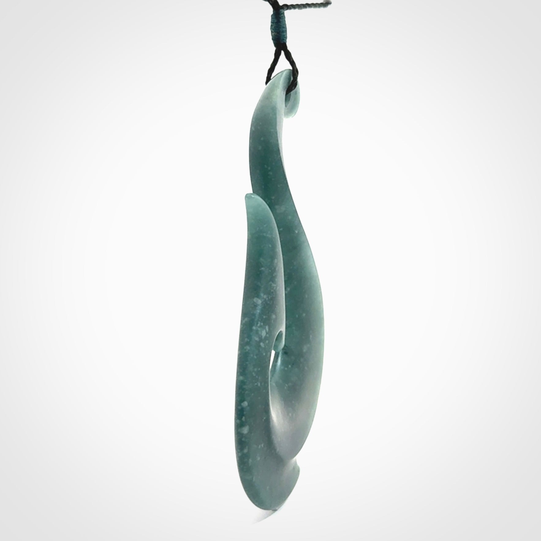 Hand carved large Guatemalan Jadeite Matau, Hook pendant.