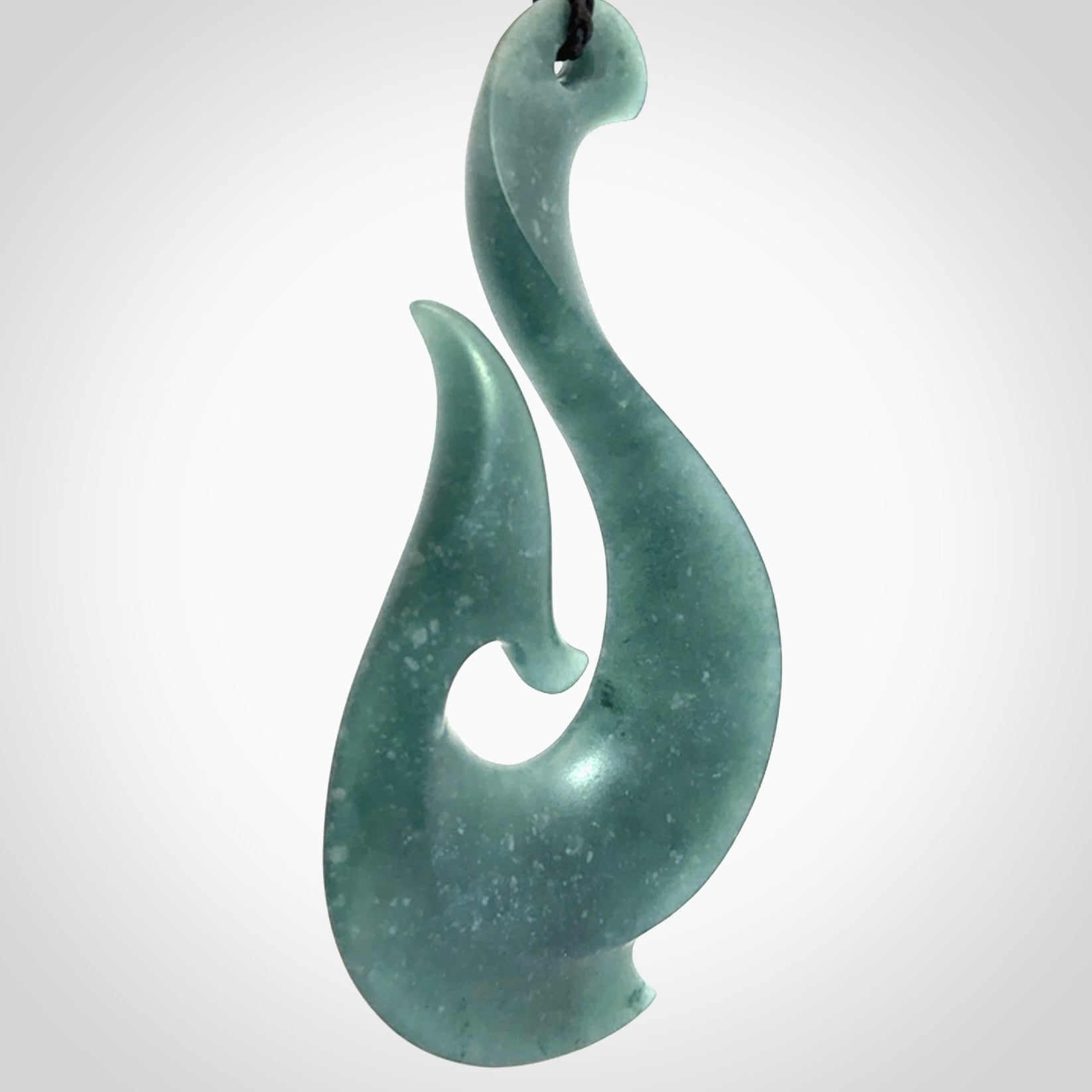 Hand carved large Guatemalan Jadeite Matau, Hook pendant.