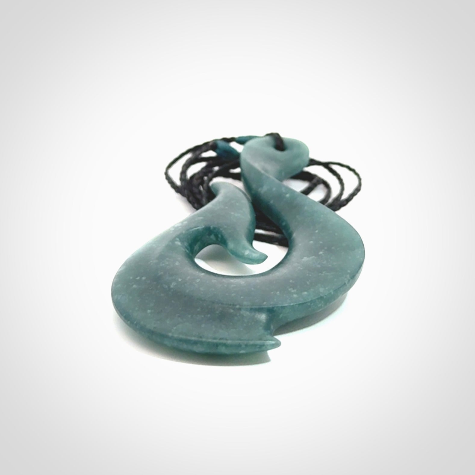 Hand carved large Guatemalan Jadeite Matau, Hook pendant.