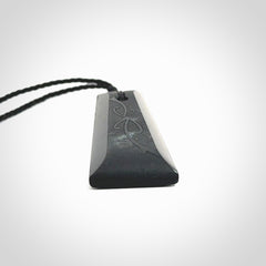 Hand made New Zealand Tangiwai toki with hammerhead engraving pendant. Hand carved in New Zealand by Kerry Thompson. Unique Jade Toki with adjustable cord.