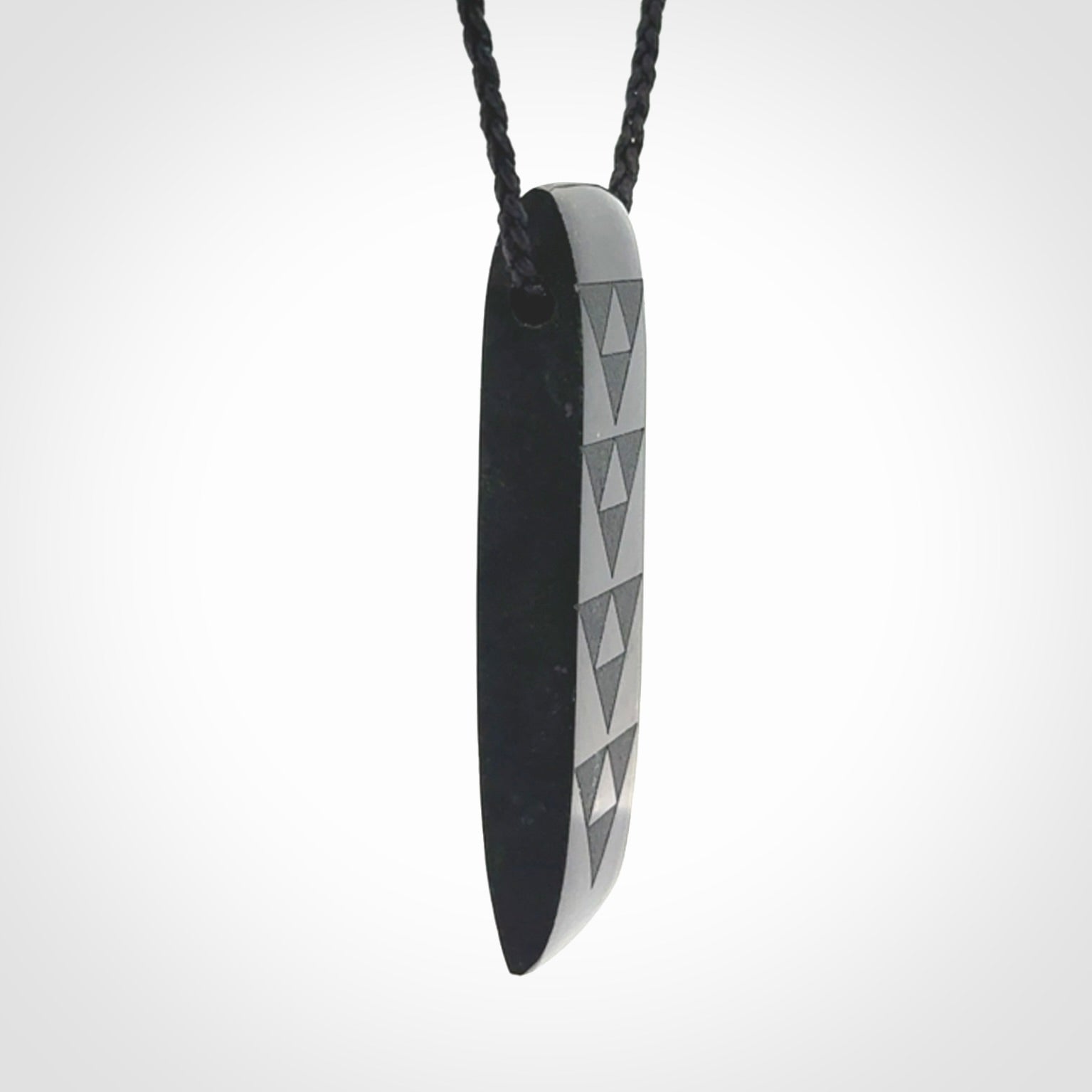 Hand made New Zealand Tangiwai toki with engraving pendant. Hand carved in New Zealand by Kerry Thompson. Unique Jade Toki with adjustable cord.