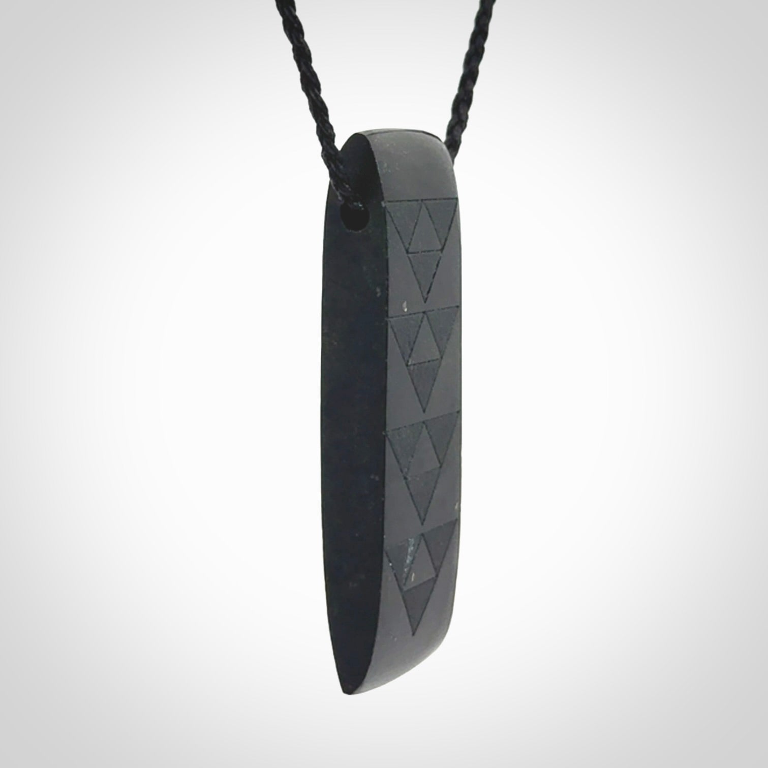 Hand made New Zealand Tangiwai toki with engraving pendant. Hand carved in New Zealand by Kerry Thompson. Unique Jade Toki with adjustable cord.