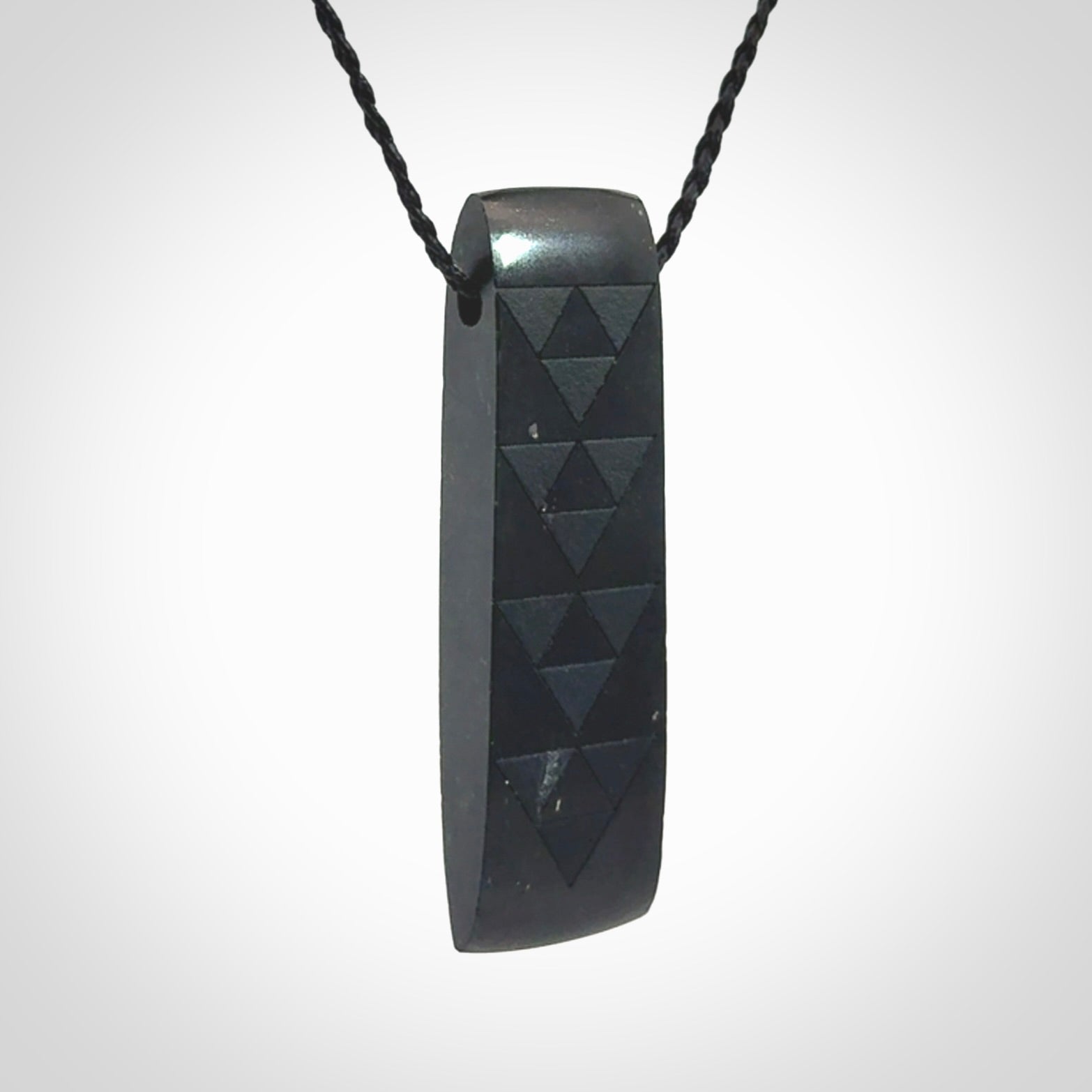 Hand made New Zealand Tangiwai toki with engraving pendant. Hand carved in New Zealand by Kerry Thompson. Unique Jade Toki with adjustable cord.