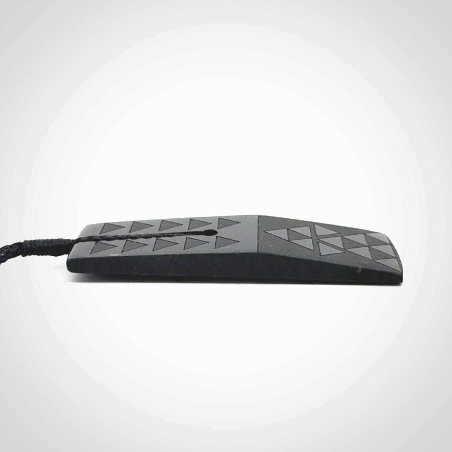 Hand made New Zealand Tangiwai toki with engraving pendant. Hand carved in New Zealand by Kerry Thompson. Unique Jade Toki with adjustable cord.