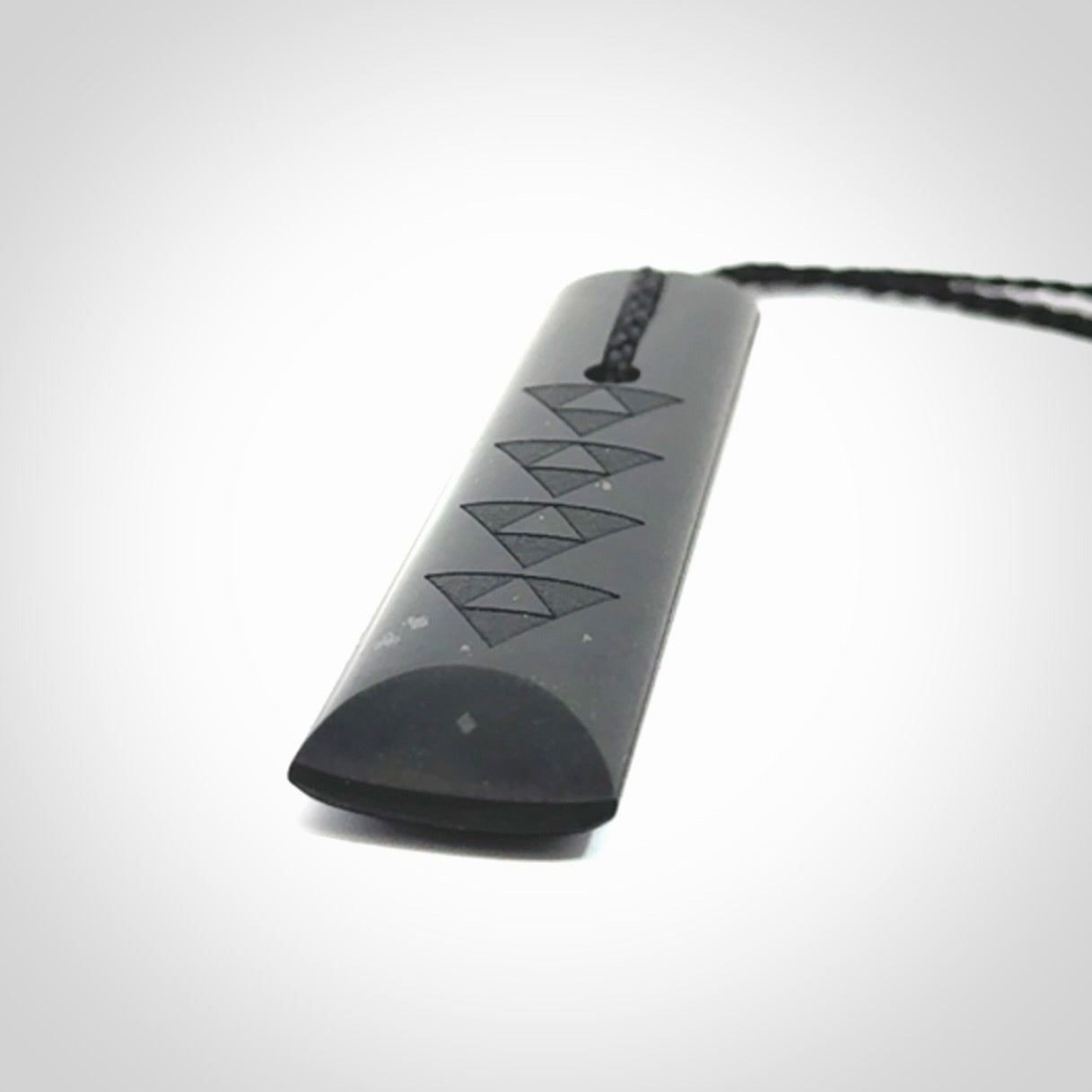 Hand made New Zealand Tangiwai toki with engraving pendant. Hand carved in New Zealand by Kerry Thompson. Unique Toki with adjustable cord.