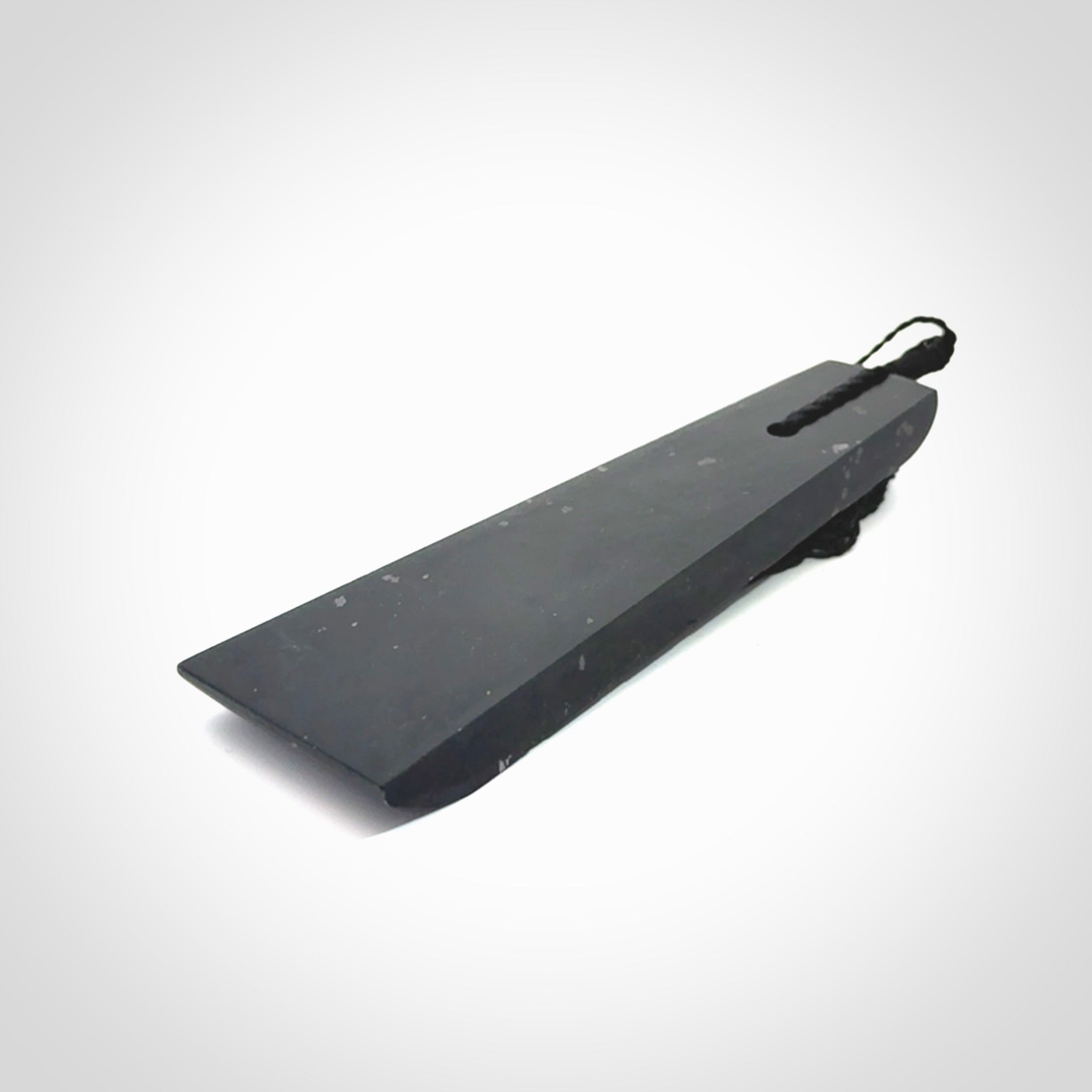 Hand made large New Zealand Tangiwai toki with koru pendant. Hand carved in New Zealand by Kerry Thompson. Unique large Jade Toki with adjustable cord.