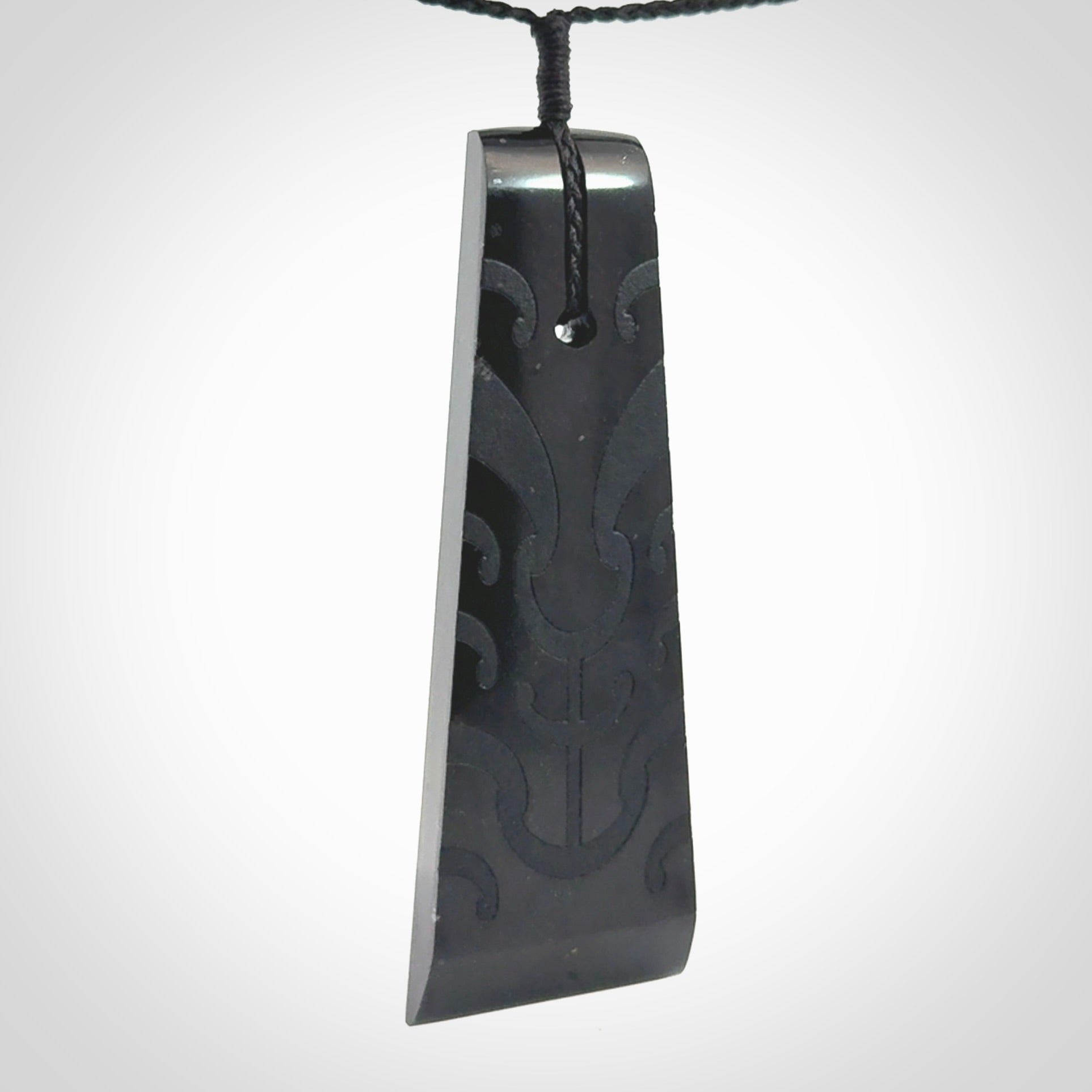 Hand made large New Zealand Tangiwai toki with koru pendant. Hand carved in New Zealand by Kerry Thompson. Unique large Jade Toki with adjustable cord.