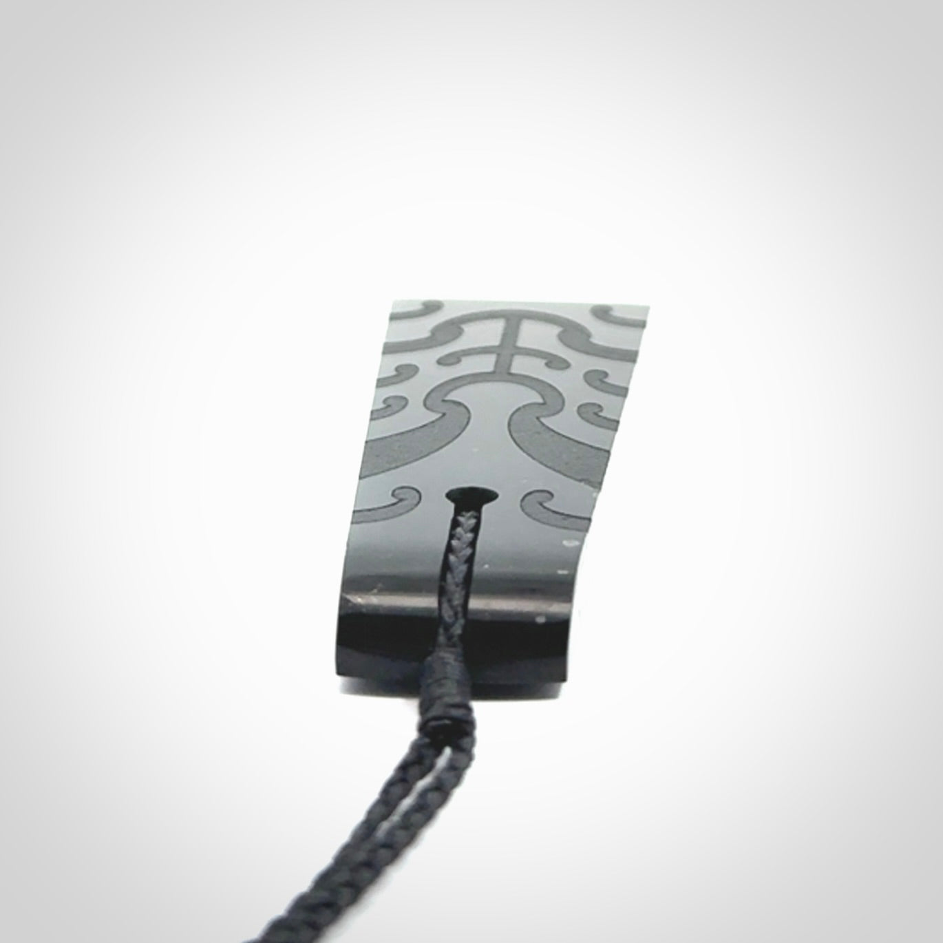 Hand made large New Zealand Tangiwai toki with koru pendant. Hand carved in New Zealand by Kerry Thompson. Unique large Jade Toki with adjustable cord.