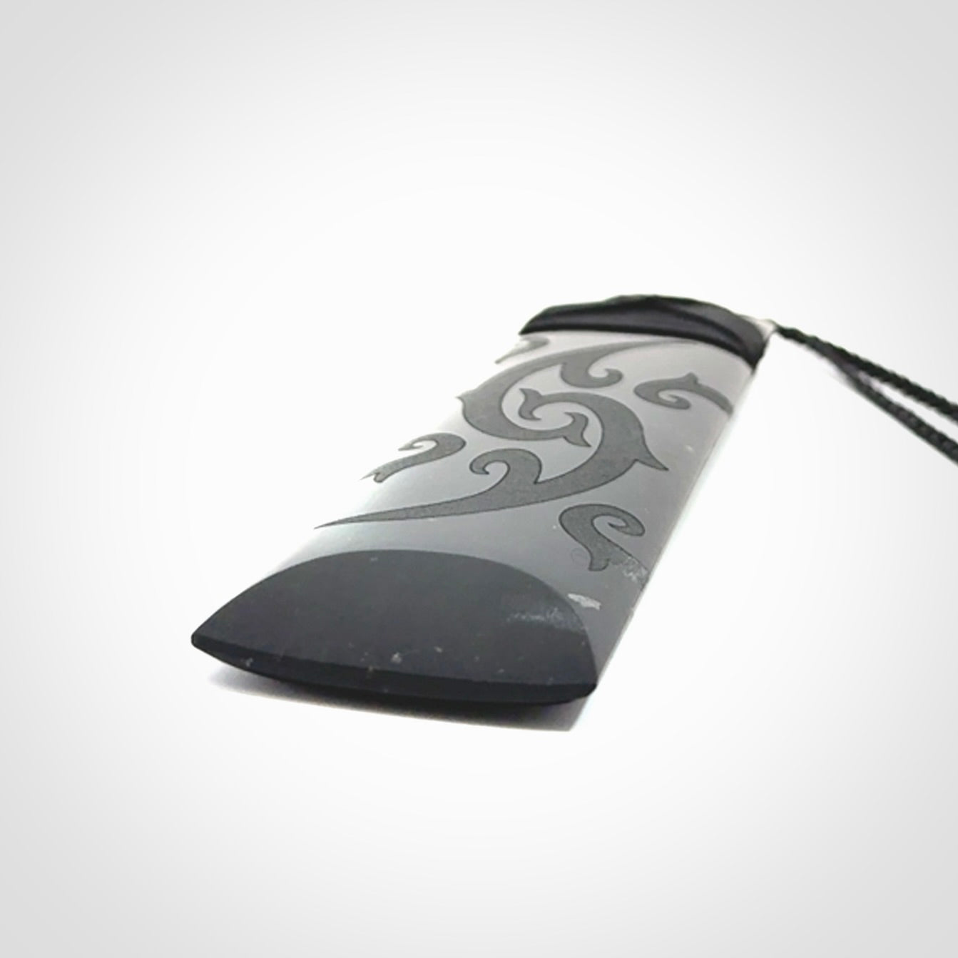 Hand made large New Zealand Tangiwai toki with koru pendant. Hand carved in New Zealand by Kerry Thompson. Unique large Jade Toki with adjustable cord.