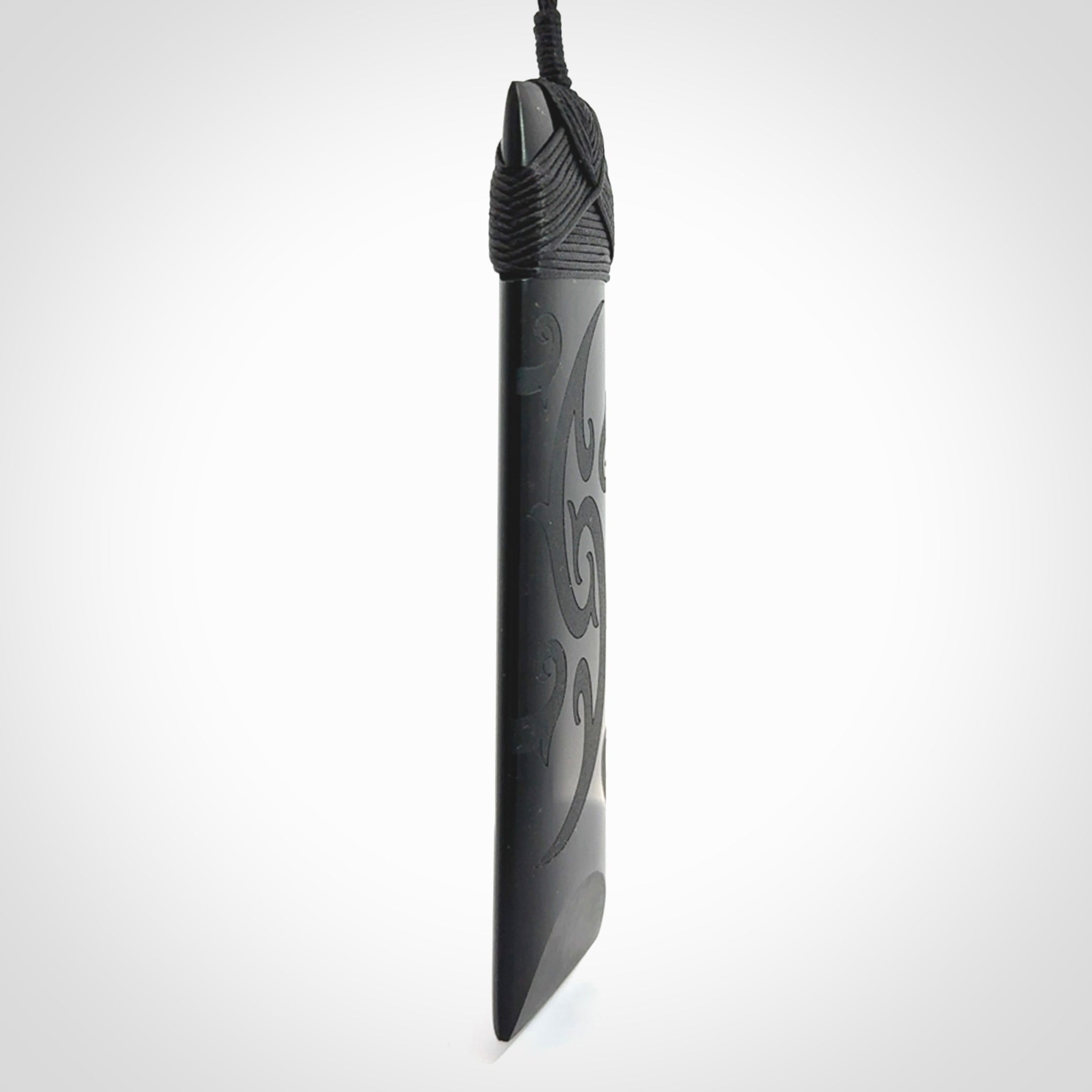 Hand made large New Zealand Tangiwai toki with koru pendant. Hand carved in New Zealand by Kerry Thompson. Unique large Jade Toki with adjustable cord.