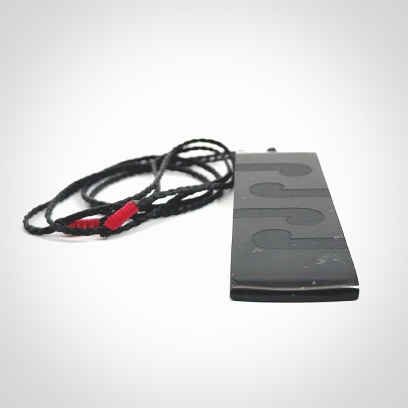 Hand made large New Zealand Tangiwai toki with koru pendant. Hand carved in New Zealand by Kerry Thompson. Unique large Jade Toki with adjustable cord.