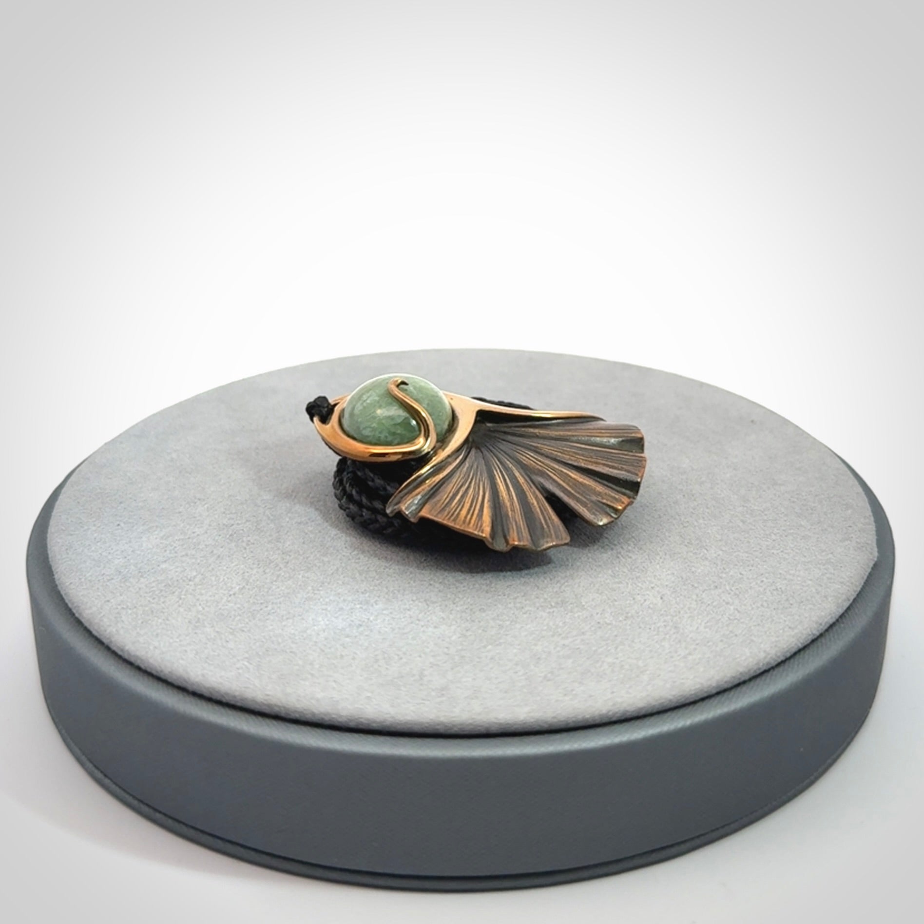 A Graceful Ginkgo Pendant in Bronze with New Zealand Jade
