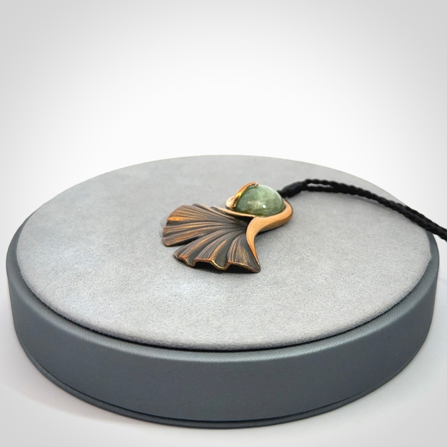 A Graceful Ginkgo Pendant in Bronze with New Zealand Jade